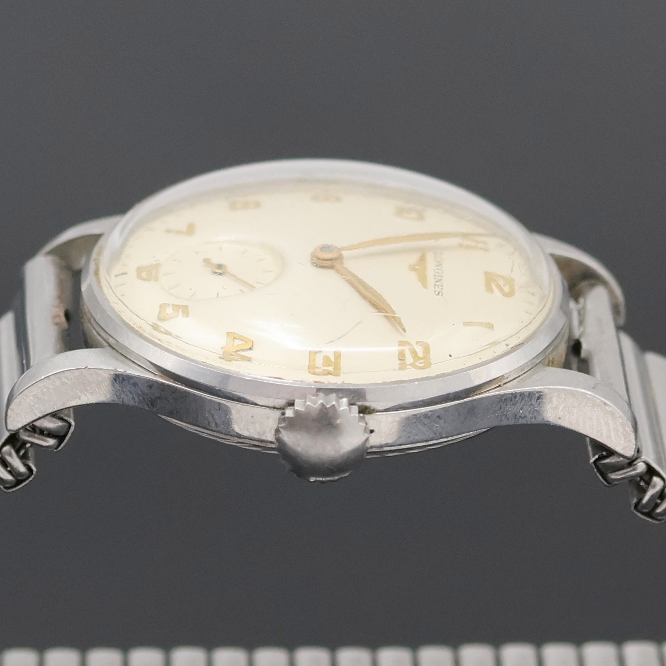 Detail c: LONGINES Herrenarmbanduhr Referenz 4858 12, Handaufzug, Schweiz um 1952, 3-teil. Stahlgeh. an Fixo-Flex Band, Boden und Glasrand aufgedr., silb. ...