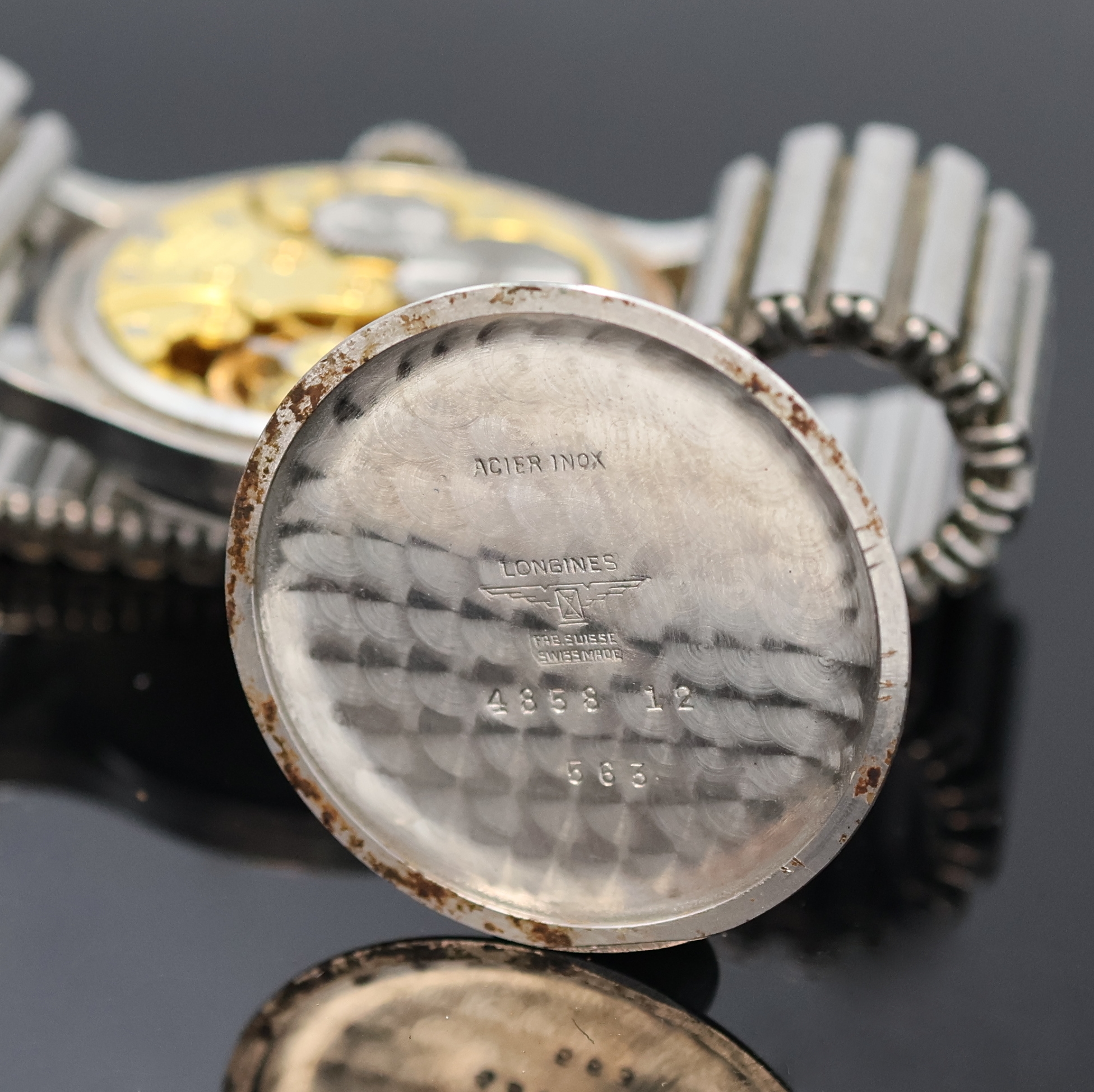 Detail f: LONGINES Herrenarmbanduhr Referenz 4858 12, Handaufzug, Schweiz um 1952, 3-teil. Stahlgeh. an Fixo-Flex Band, Boden und Glasrand aufgedr., silb. ...
