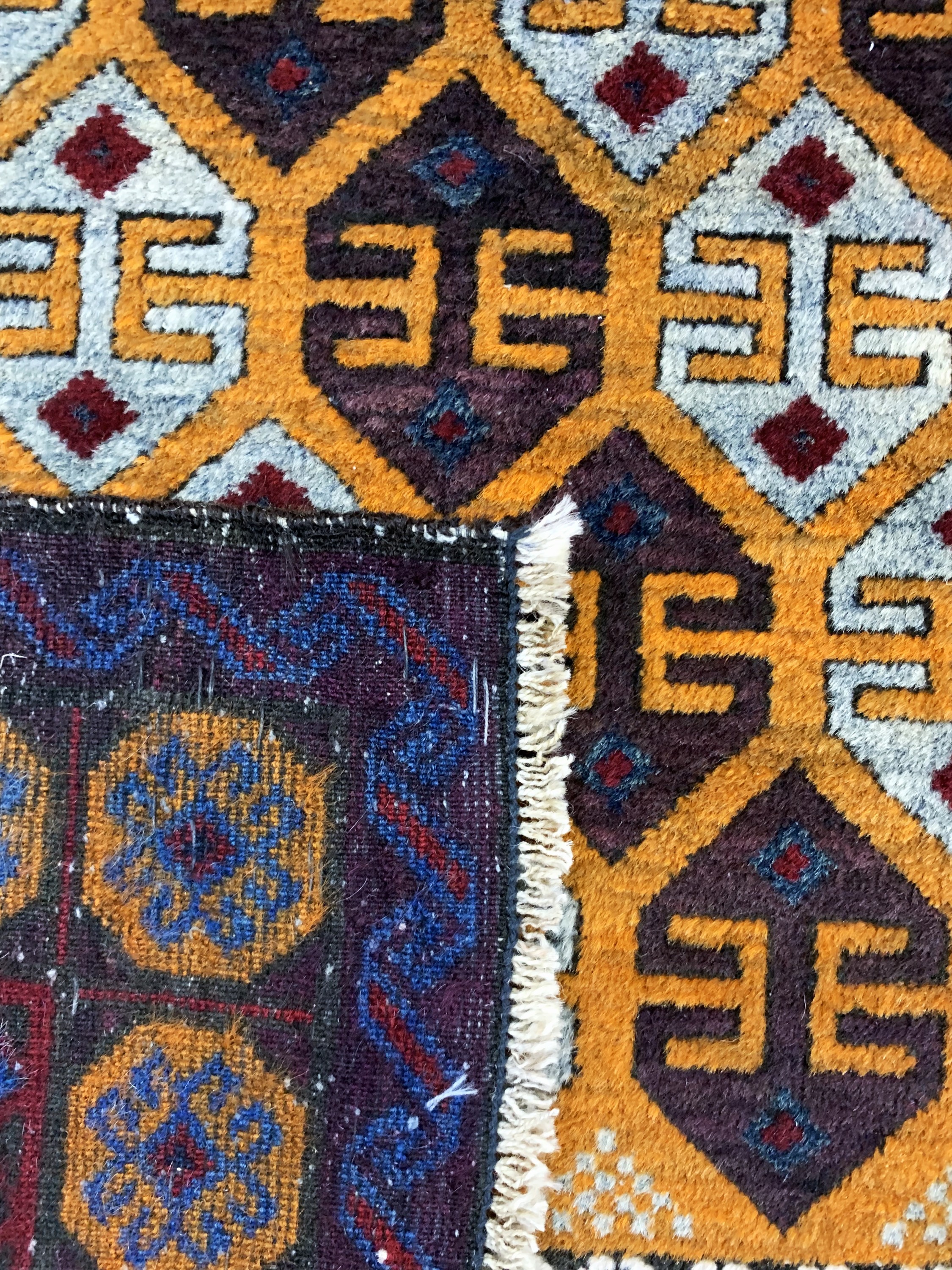 Detail e: Belutsch, Afghanistan, Anfang 20.Jhd, Wolleauf Baumwolle, ca. 200 x 117 cm, EHZ: 2