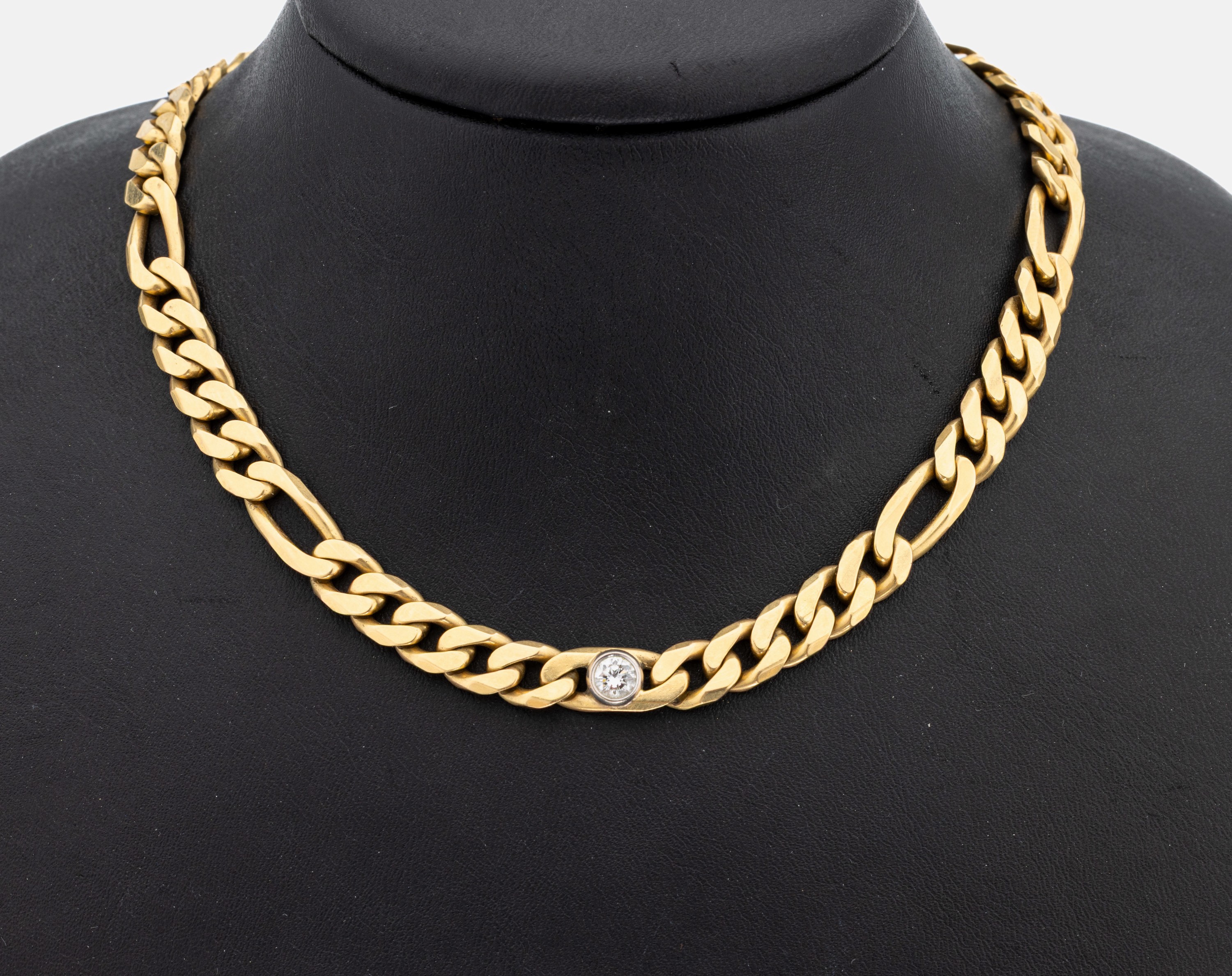 18 kt Gold Brillant-Collier, GG/WG 750/000,schwere massive Verarbeitung, mittig in WG gefasster Brillant ca. 0.40 ct Weiß/vs, L. ca. 57 cm, ...