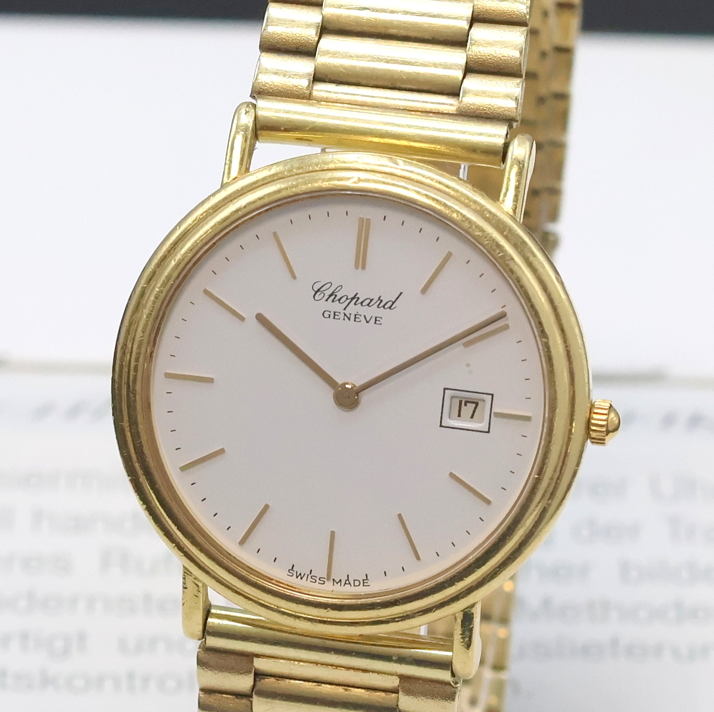 Detail a: CHOPARD Herrenarmbanduhr in GG 750/000 Referenz 16/1101 an GG 585/000 Band, quarz, 2-teil. Geh., Lünette gegen Boden 8-fach verschr., emailfarb. ...