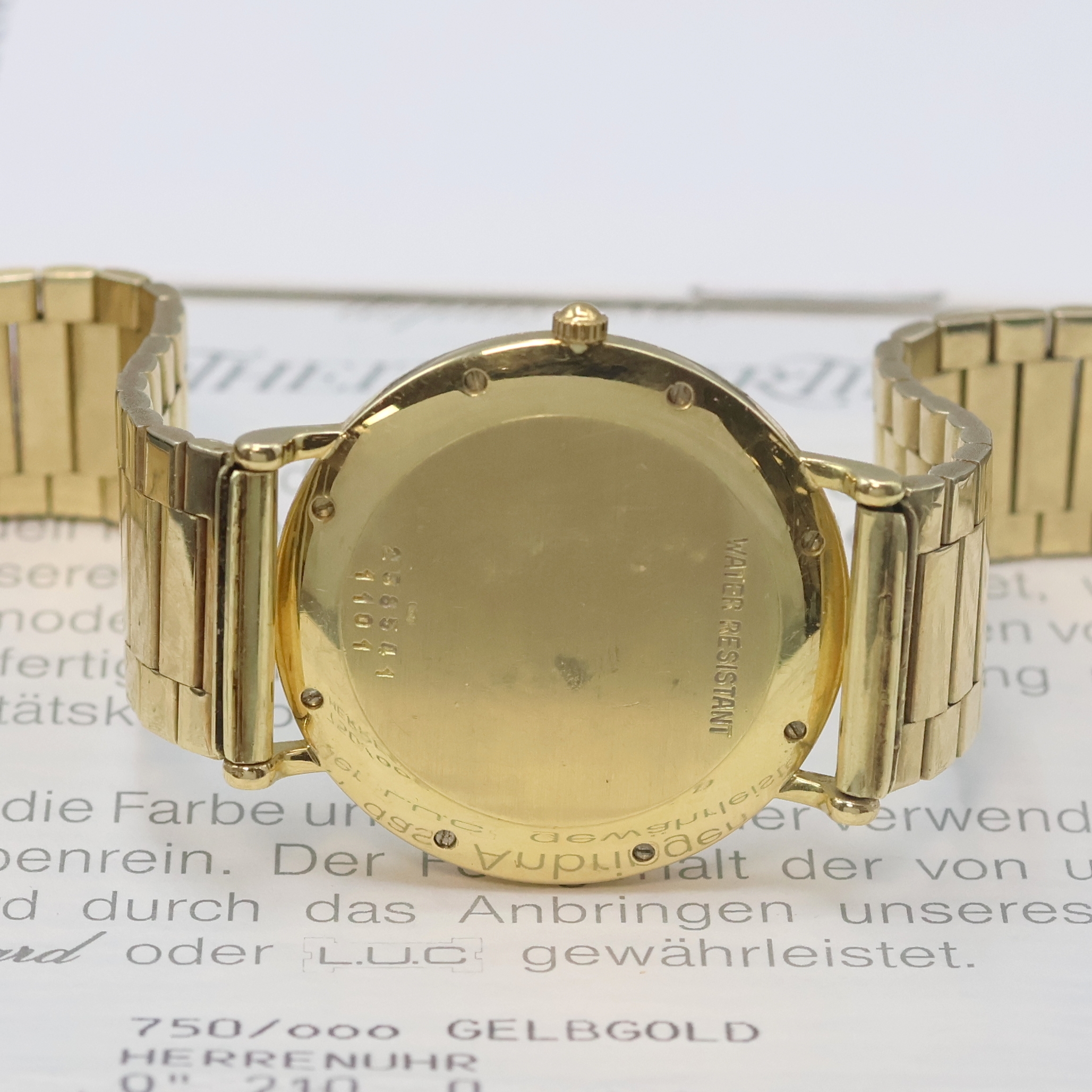 Detail d: CHOPARD Herrenarmbanduhr in GG 750/000 Referenz 16/1101 an GG 585/000 Band, quarz, 2-teil. Geh., Lünette gegen Boden 8-fach verschr., emailfarb. ...