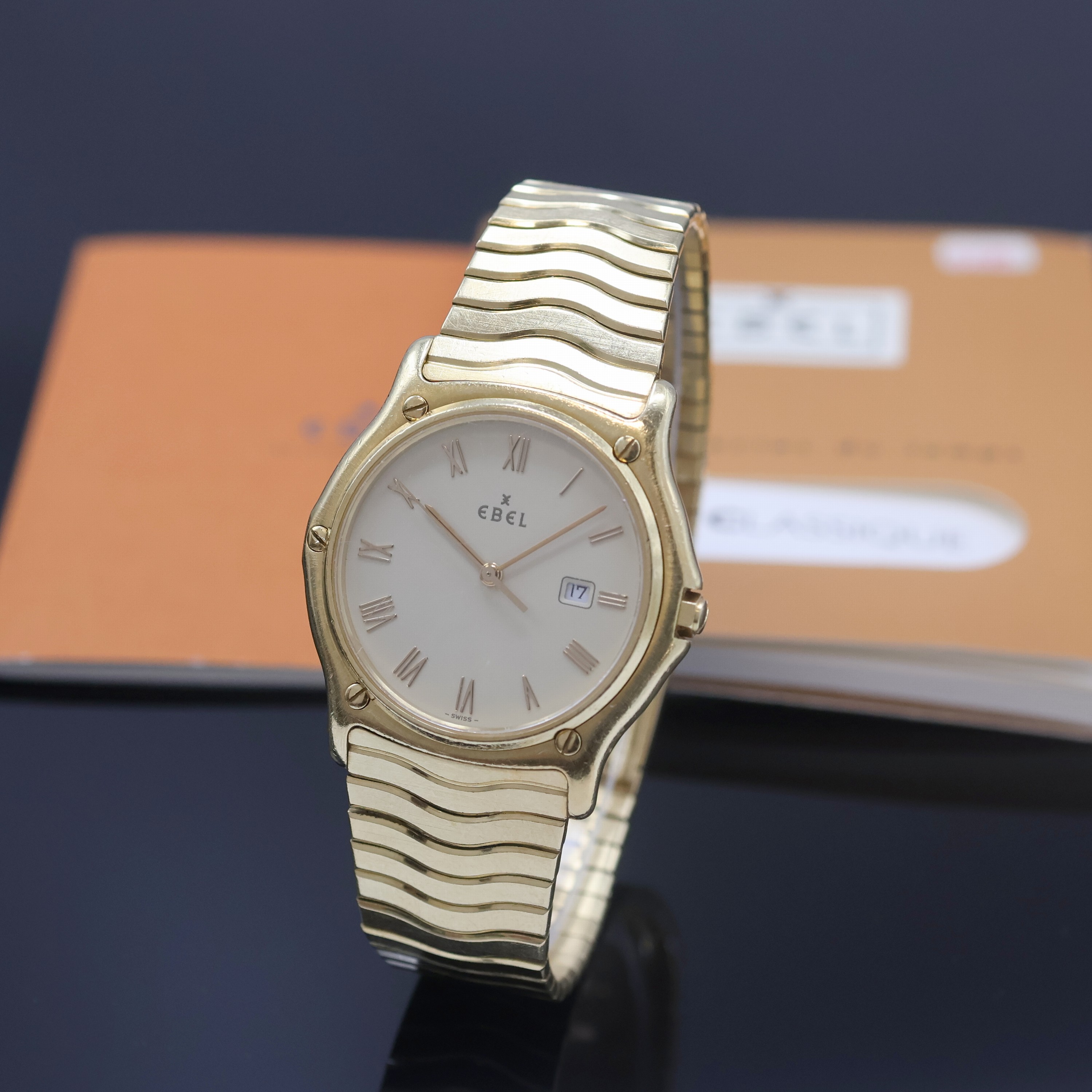 EBEL Herrenarmbanduhr Sport Classique in GG 750/000 Referenz 883903, quarz, massives, 2 -teil. Geh. inkl. Wellengliederband m. Faltschl., Lünette ...