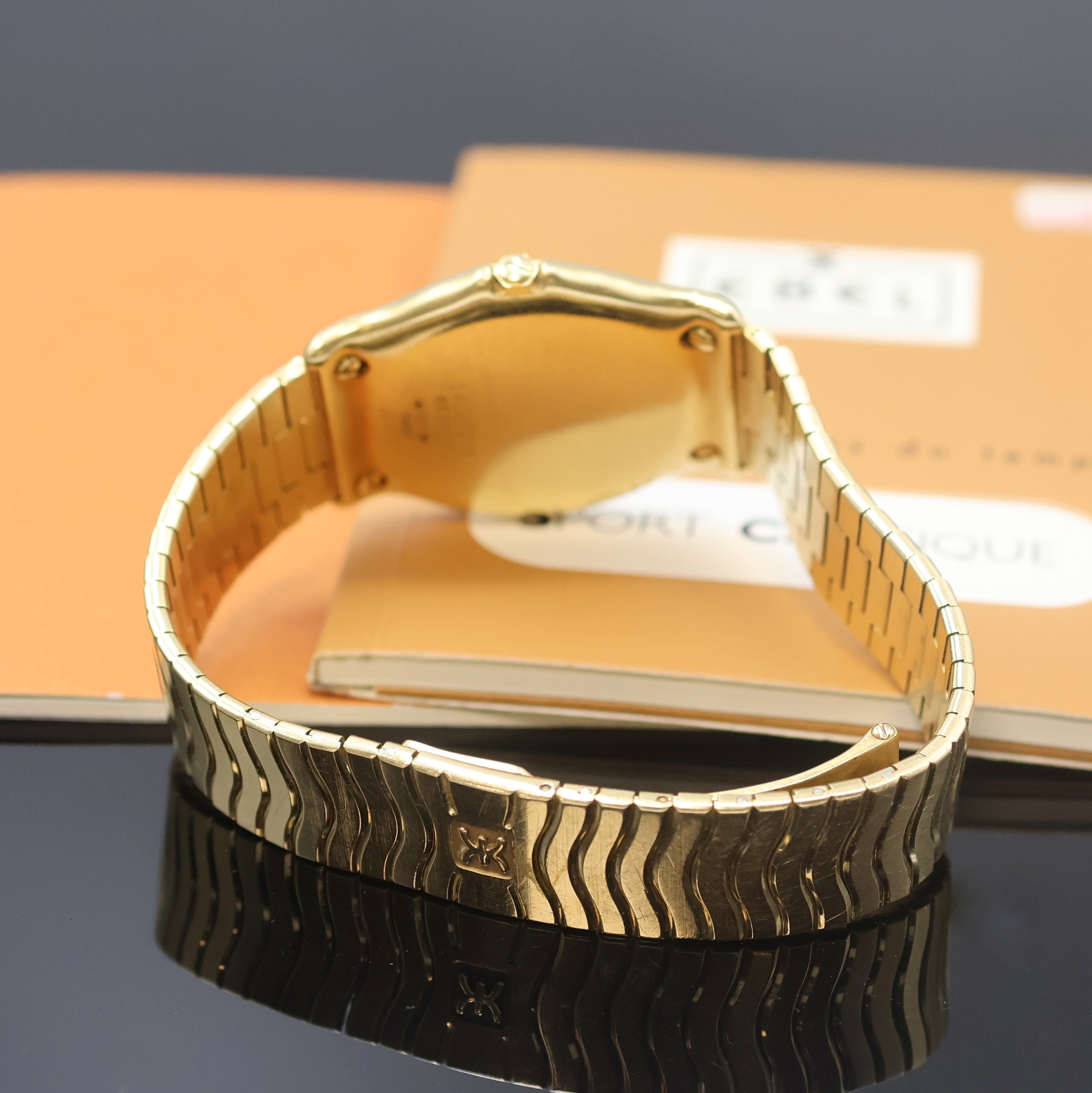 Detail b: EBEL Herrenarmbanduhr Sport Classique in GG 750/000 Referenz 883903, quarz, massives, 2 -teil. Geh. inkl. Wellengliederband m. Faltschl., Lünette ...