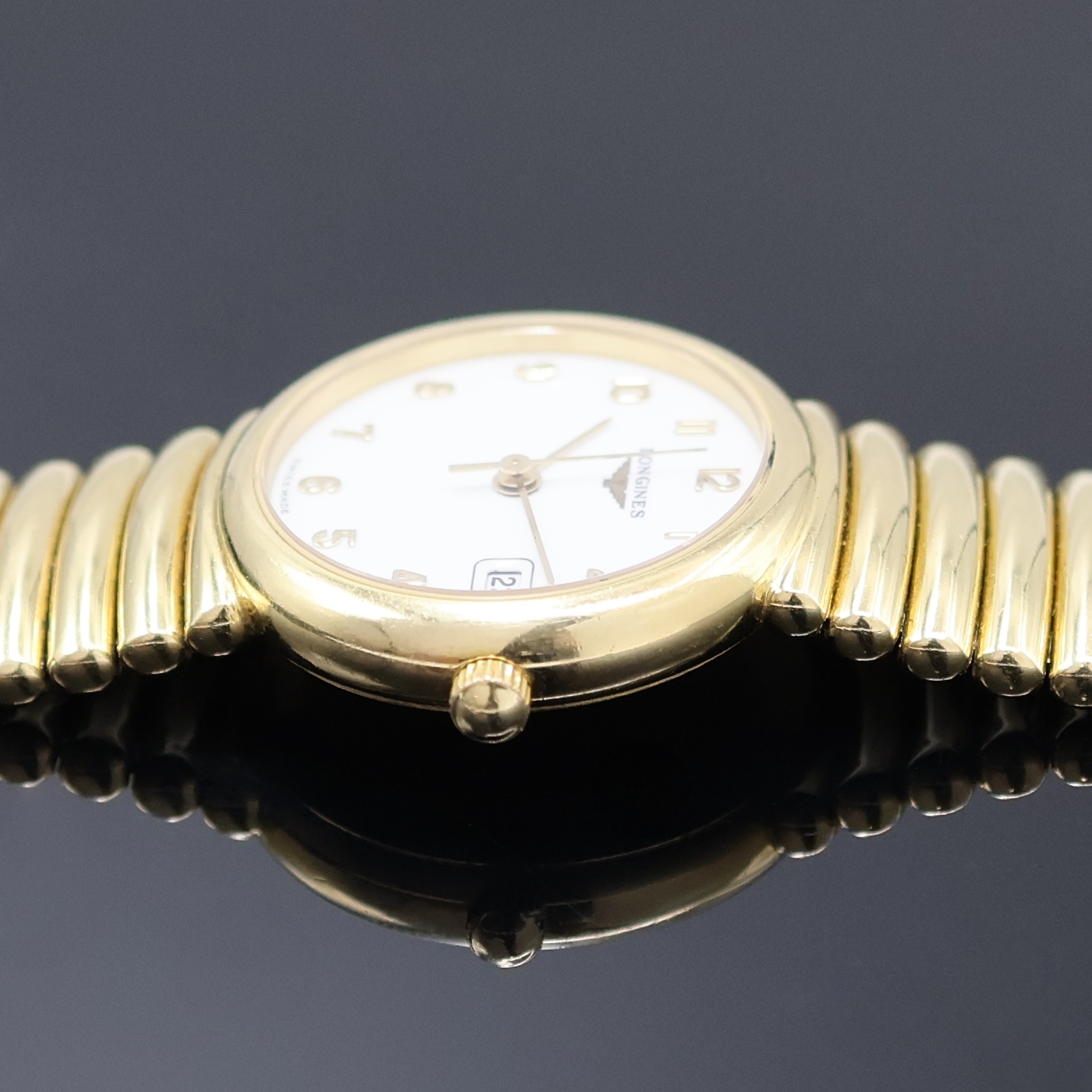 Detail c: LONGINES Damenarmbanduhr in GG 750/000, Schweiz um 1990, massives Geh. inkl. Gliederband, Boden aufgedr., quarz, emailfarb. Zifferbl. m. arab. Std., ...
