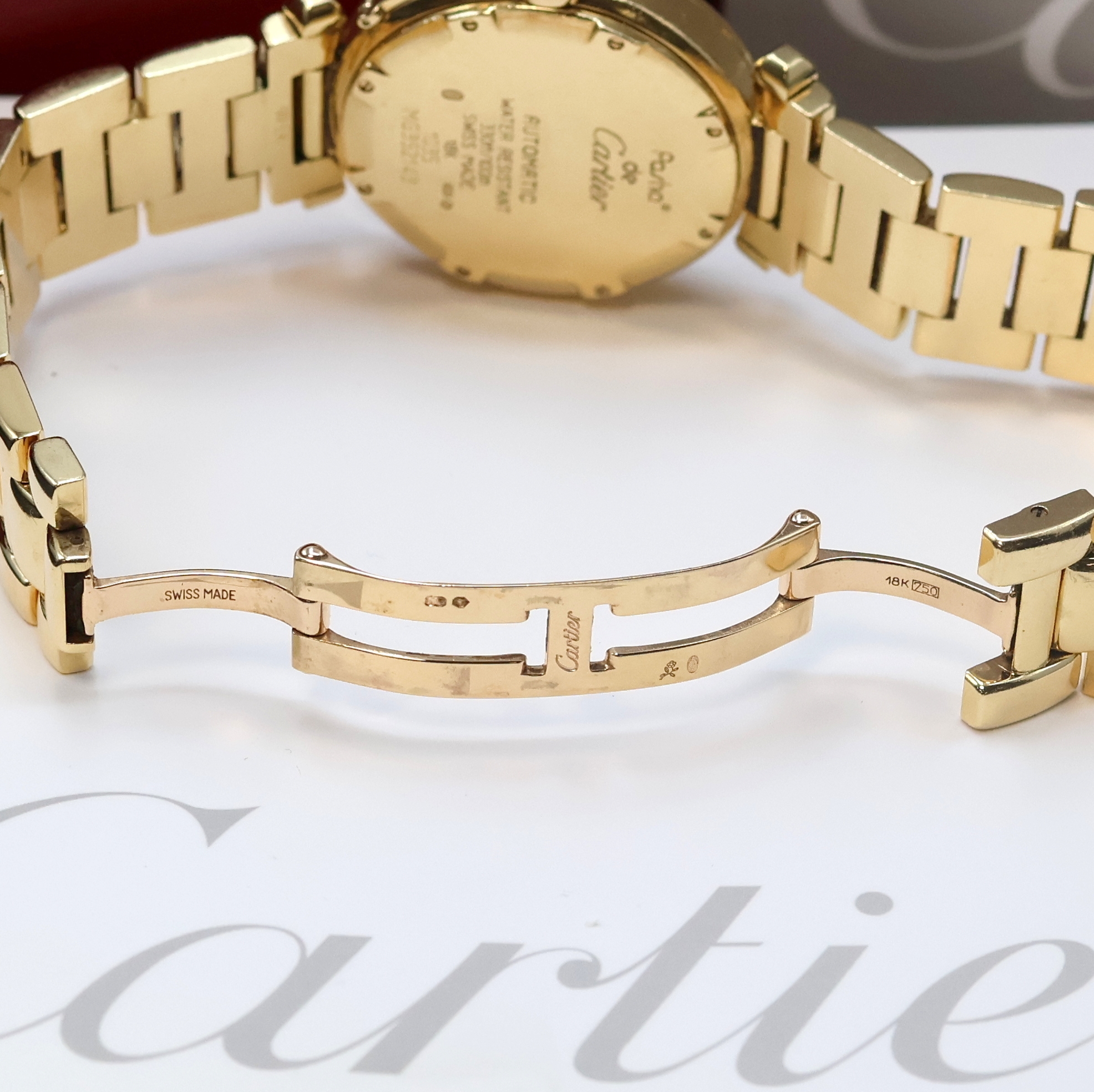Detail b: CARTIER Pasha C Armbanduhr in GG 750/000 Referenz W3013456 / 1035, Automatik, massives Goldgeh. inkl. orig. Gliederband m. dopp. Faltschl., zus. ...