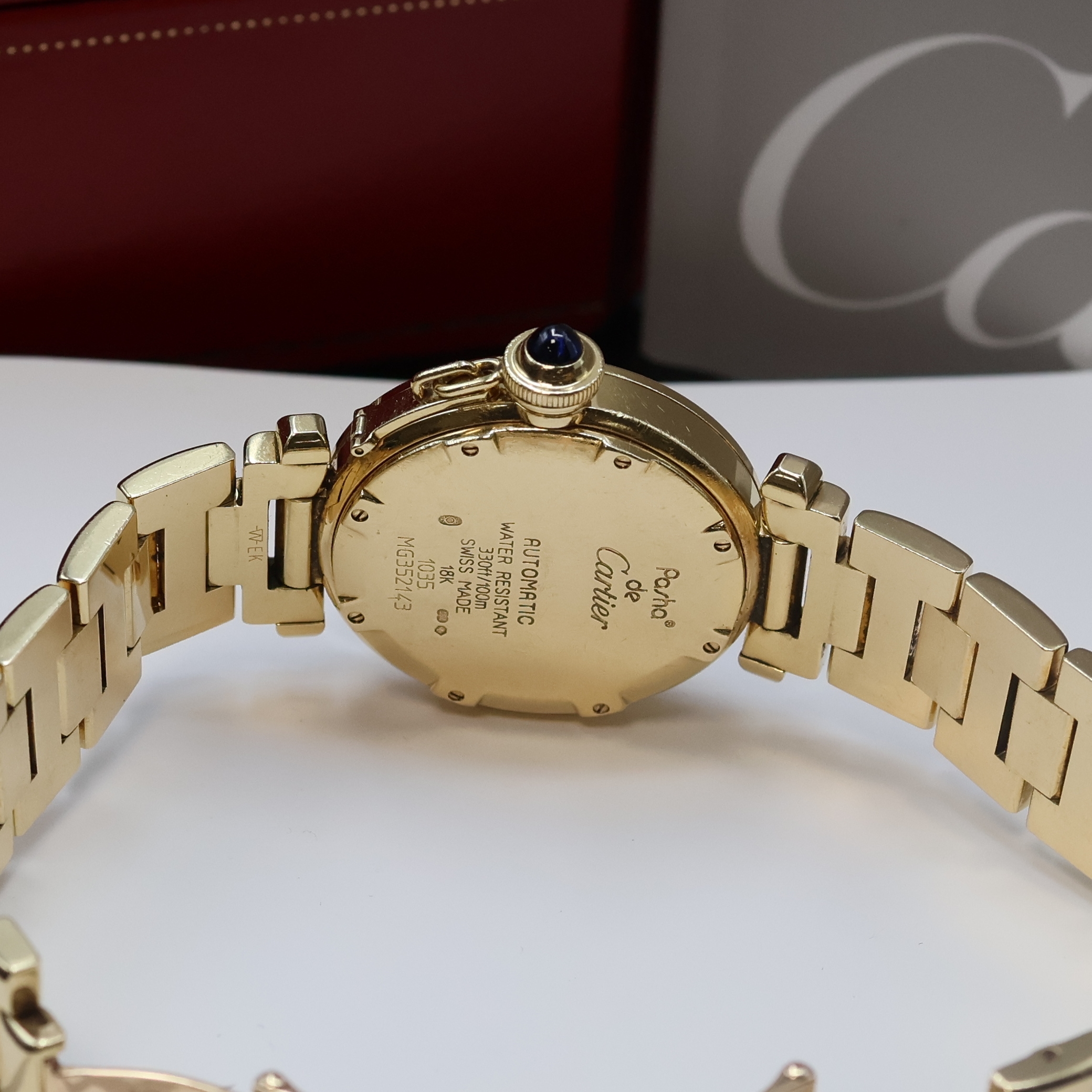 Detail d: CARTIER Pasha C Armbanduhr in GG 750/000 Referenz W3013456 / 1035, Automatik, massives Goldgeh. inkl. orig. Gliederband m. dopp. Faltschl., zus. ...