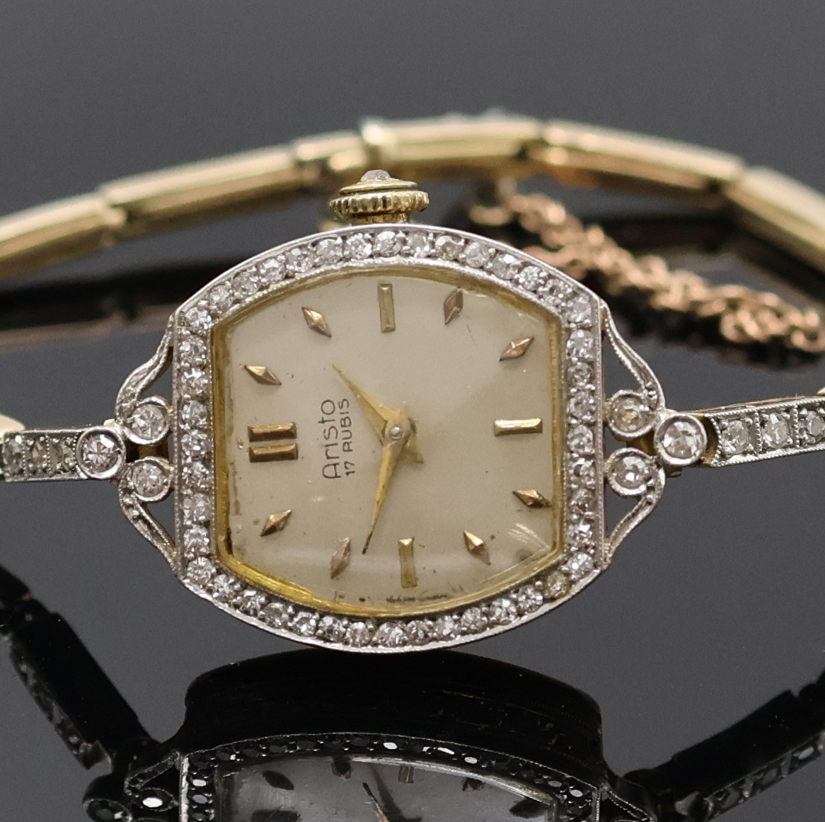 Detail a: ARISTO diamantbesetzte Art-Deco Damenarmbanduhr in GG 585/000, Schweiz um 1920, Handaufzug, Band in GG/WG 585/000 m. Sicherheitskettchen, Lünette, ...