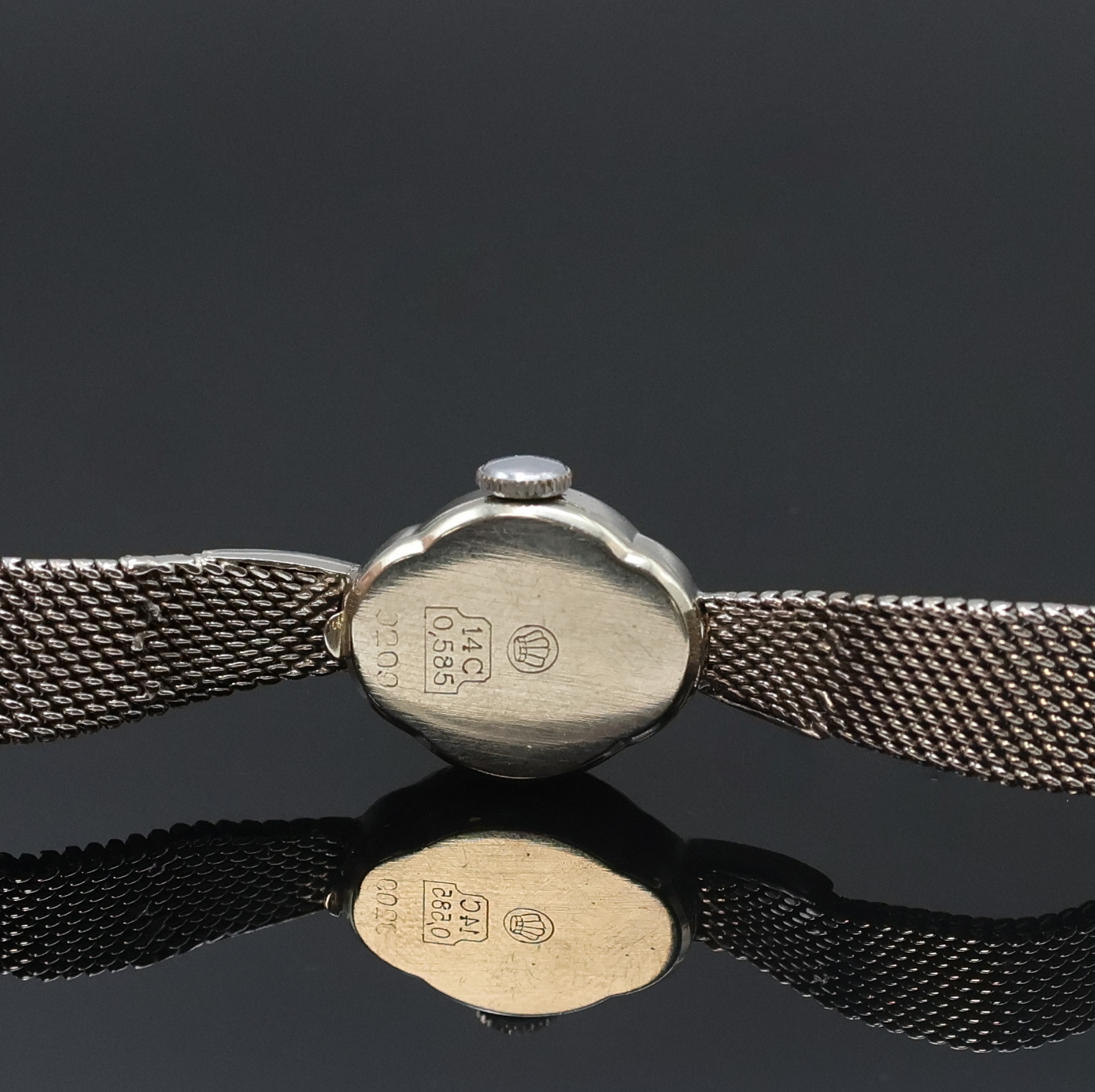 Detail c: PIAGET Damenarmbanduhr in WG 585/000, Schweiz um 1960, Handaufzug, neutr. Geh. u. Band (Anstöße m. Diamanten), Boden aufgedr., silb. Zifferbl. ...