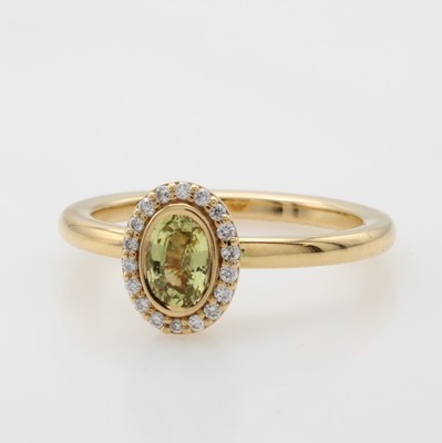 Image Ring mit Saphir und Brillanten, RG 750/000, ovaler, gelber Saphir ca. 6x4 mm umfasst v. ...