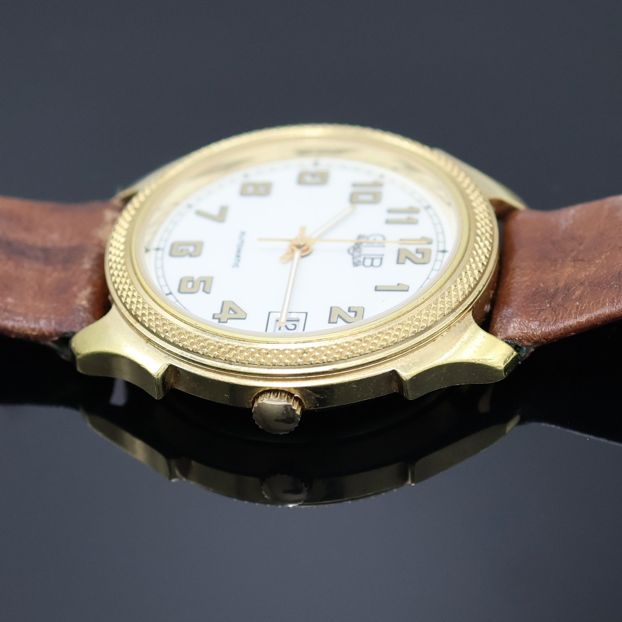 Detail b: GUB Glashütte SA Herrenarmbanduhr, Deutschland um 1990, Automatik, verg. Geh., guill. Lünette, Stahlboden aufgedr., emailfarb. Zifferbl. m. arab. ...