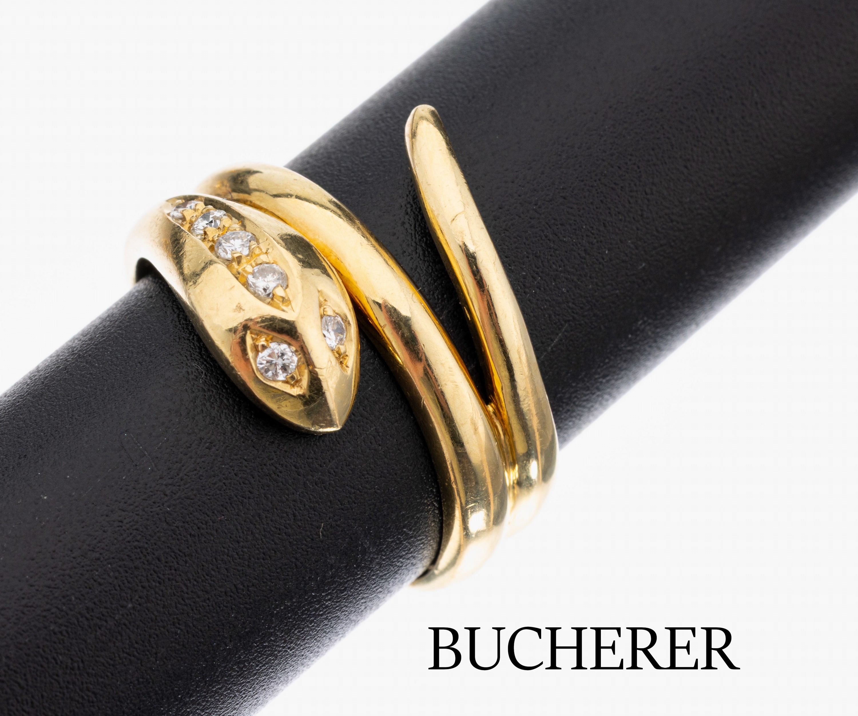 18 kt Gold BUCHERER Brillant-Schlangenring, GG 750/000, Kopf mit 6 Brillanten zus. ca. 0.10 ct Weiß/si, RW 59, ca. 8.0 g, Meistermarke CB