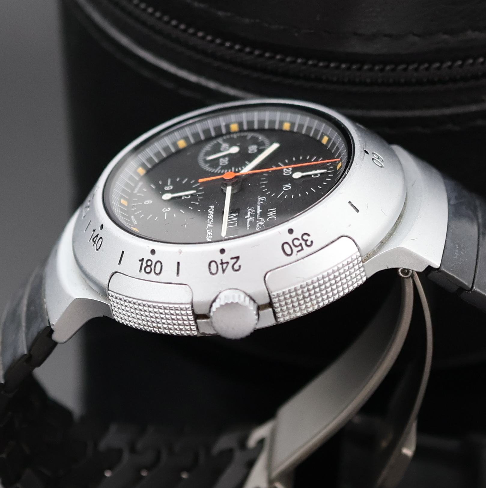 Detail c: IWC Porsche Design Armbandchronograph Referenz 3701, Automatik, Schweiz um 1988, Aluminiumgeh. inkl. orig. Kunststoff- Gliederband m. Faltschl., ...
