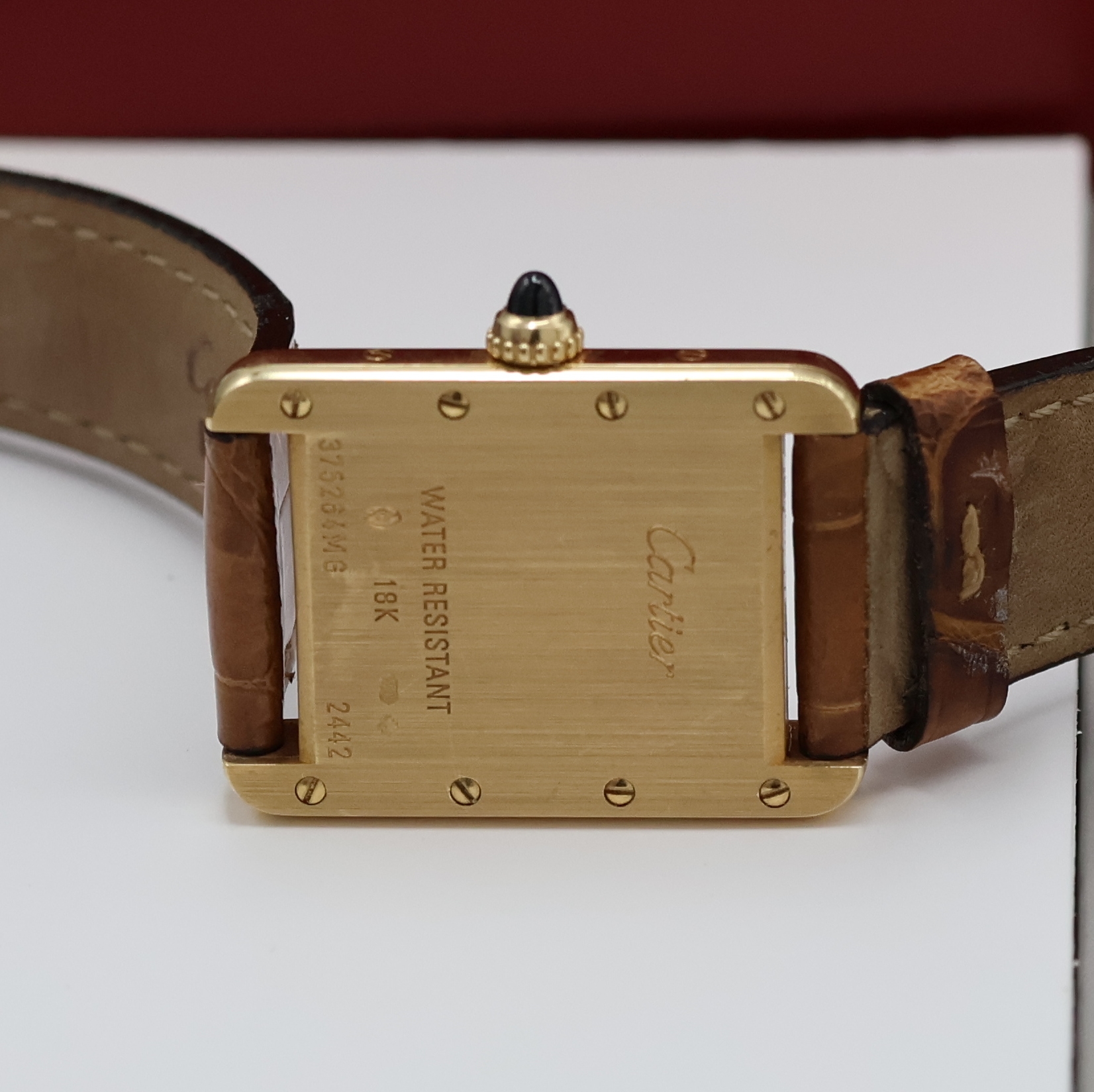 Detail d: CARTIER Damenarmbanduhr Tank Louis Cartier in GG 750/000 Referenz 2442, quarz, 2-teil. Geh., Boden 8-fach verschr., orig. Lederband m. orig. GG ...