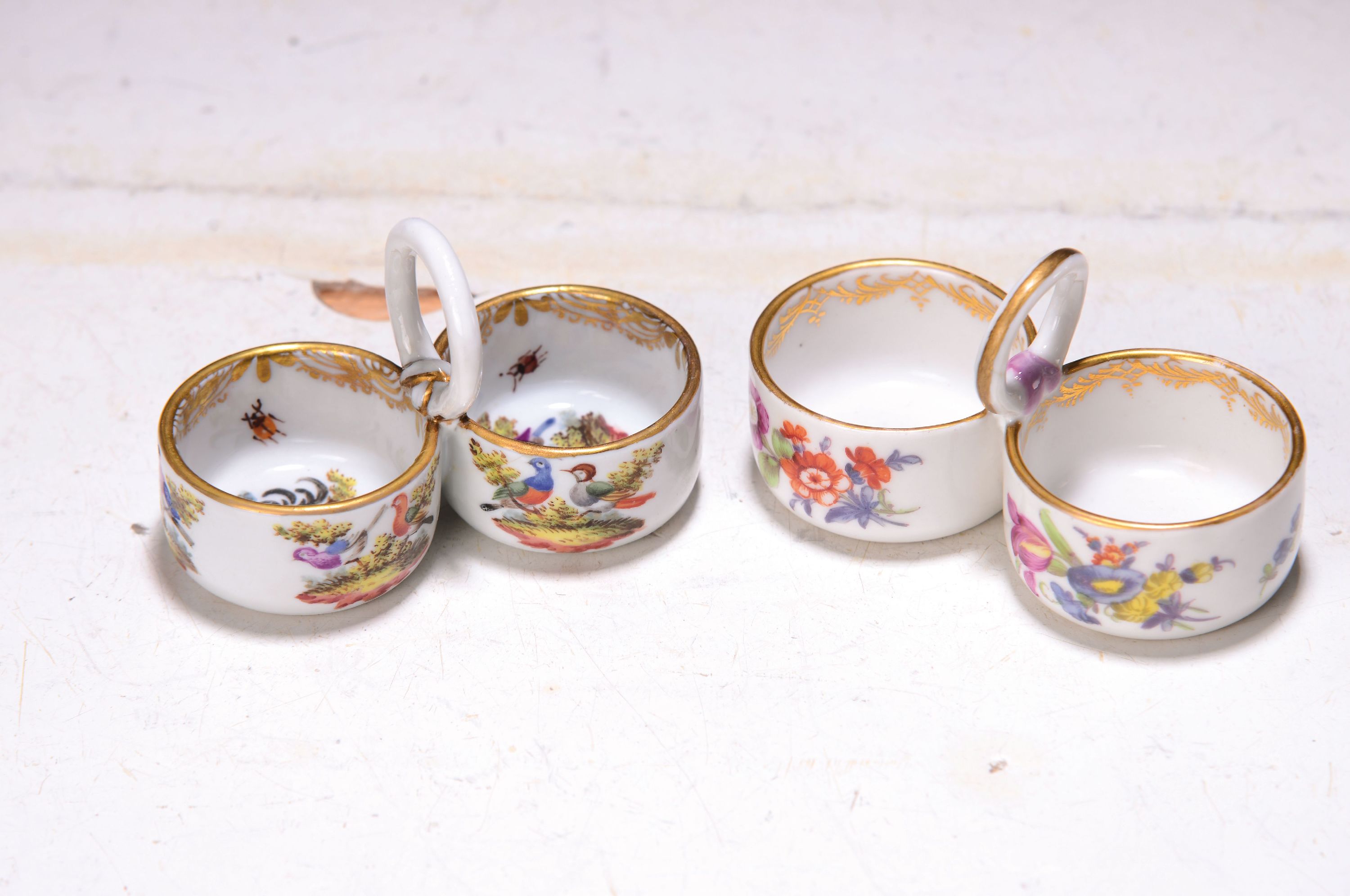 Detail a: Zwei Gewürzschälchen, Meissen, um 1890/1900, jeweils Doppelschälchen, polychrom bemalt, einmal mit umlaufender Blumenmalerei u. Goldstaffage; ...