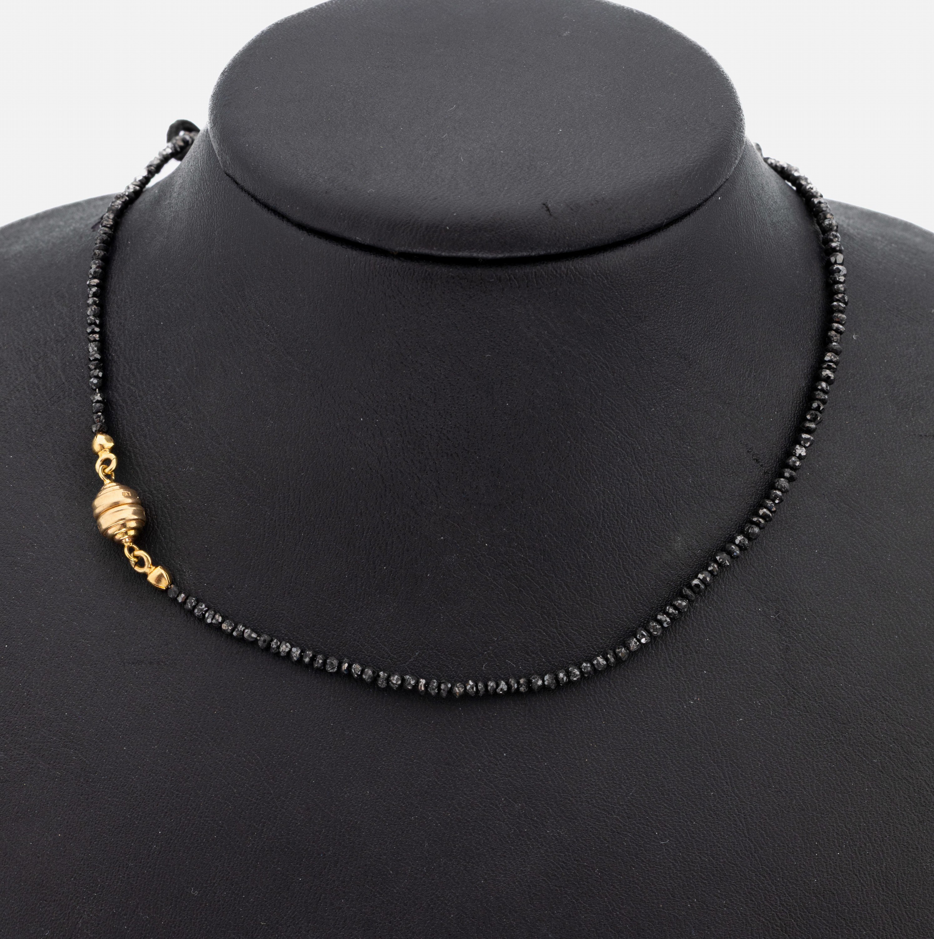 Collier aus Diamanten, Magnetschließe GG 585/000, schwarze facett. Diamanten (beh.), L. ca. 45 cm