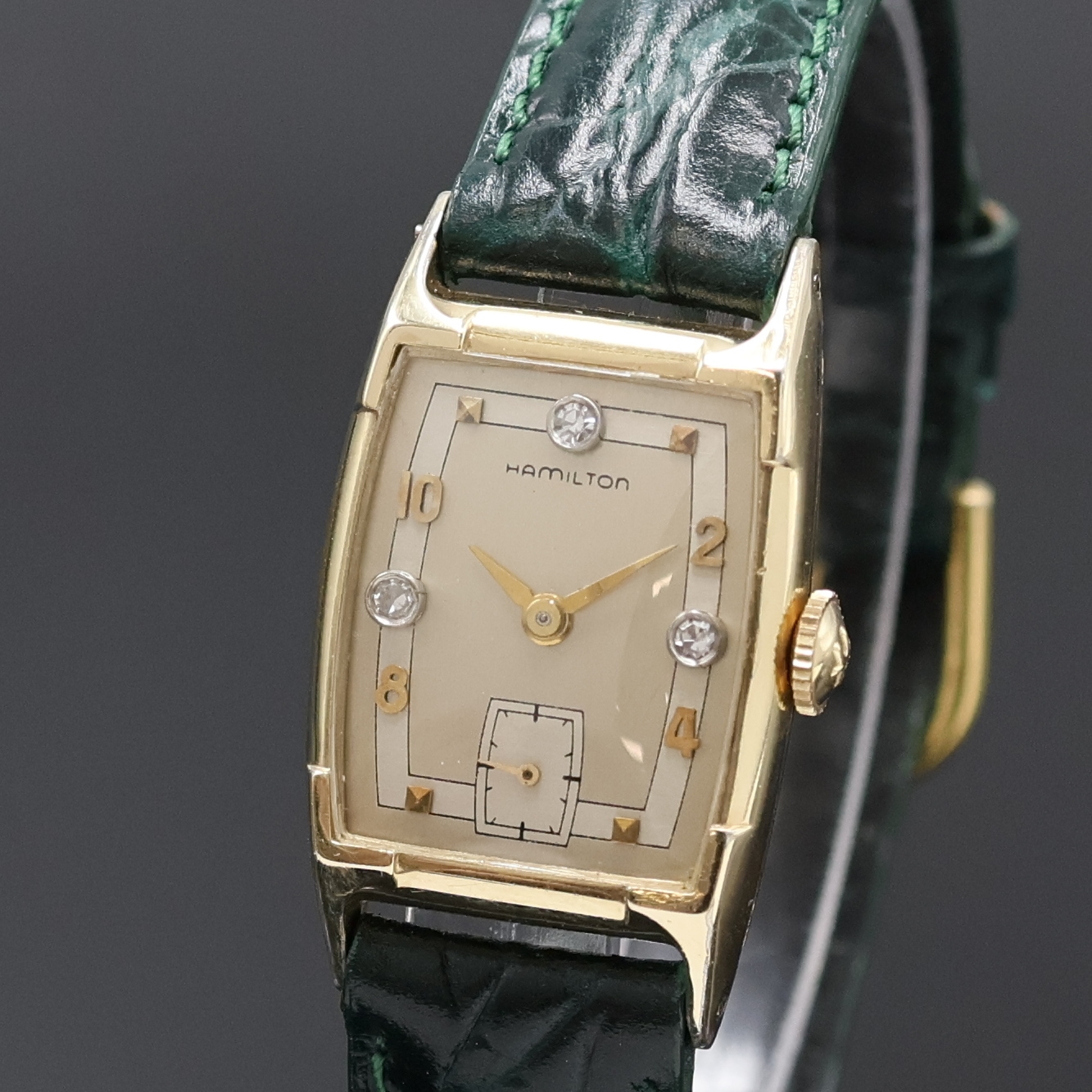 Detail a: HAMILTON Armbanduhr, Handaufzug, USA um 1940, Tonnenform 14k Gold Filled Geh. in sich gew., Boden aufgedr., vers. Duoton-Zifferbl. m. 3 aufges. ...