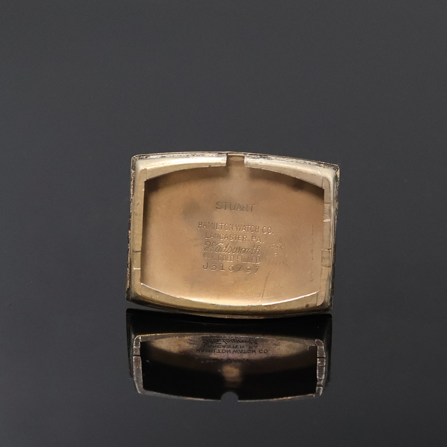 Detail d: HAMILTON Armbanduhr, Handaufzug, USA um 1940, Tonnenform 14k Gold Filled Geh. in sich gew., Boden aufgedr., vers. Duoton-Zifferbl. m. 3 aufges. ...