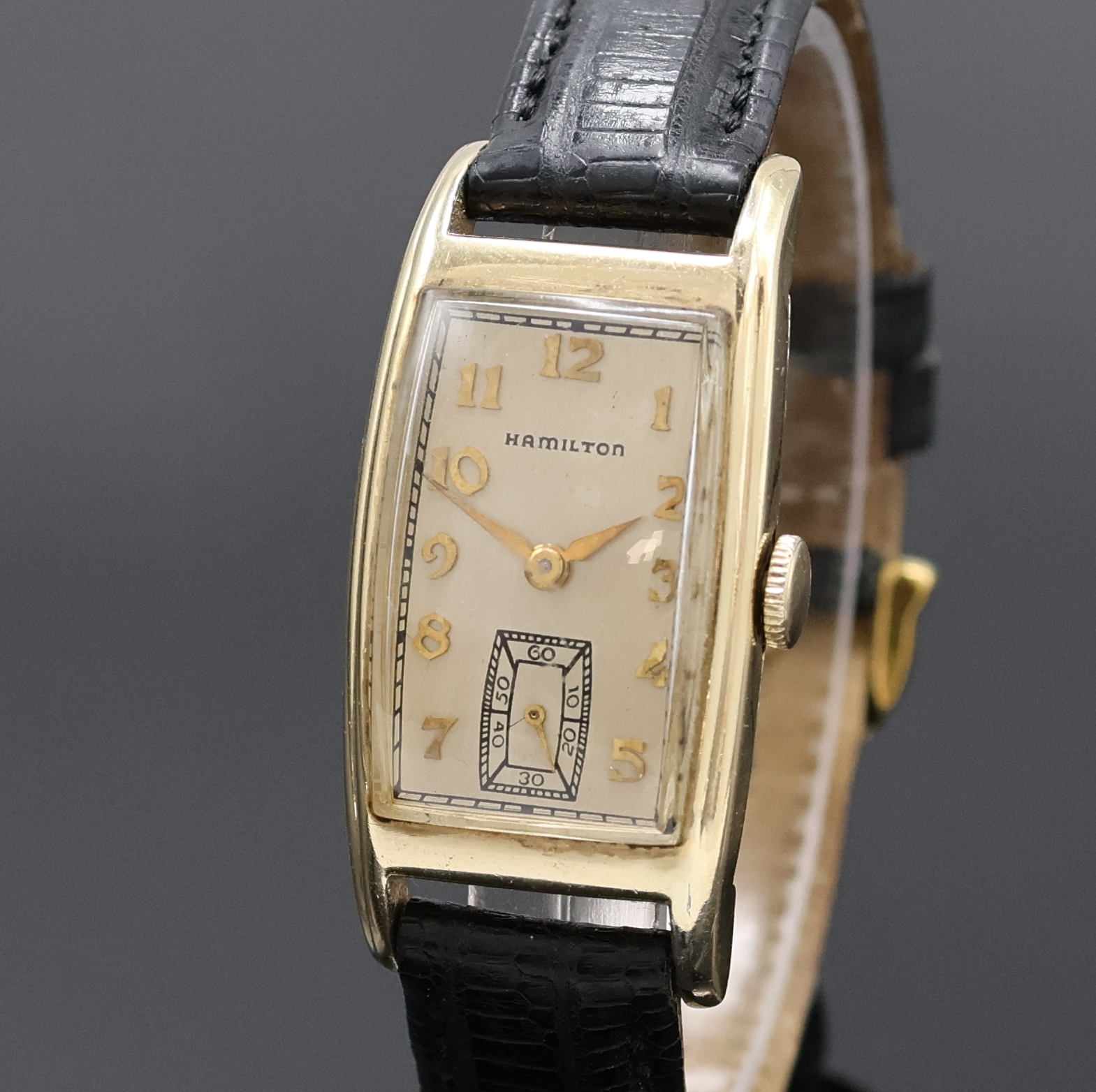 Detail a: HAMILTON Armbanduhr, USA um 1939, Handaufzug, 2-tlg. 10k Gold-filled Geh. in sich gewölbt, Boden aufgedr., silb. Zifferbl., aufges. gold. arab. ...