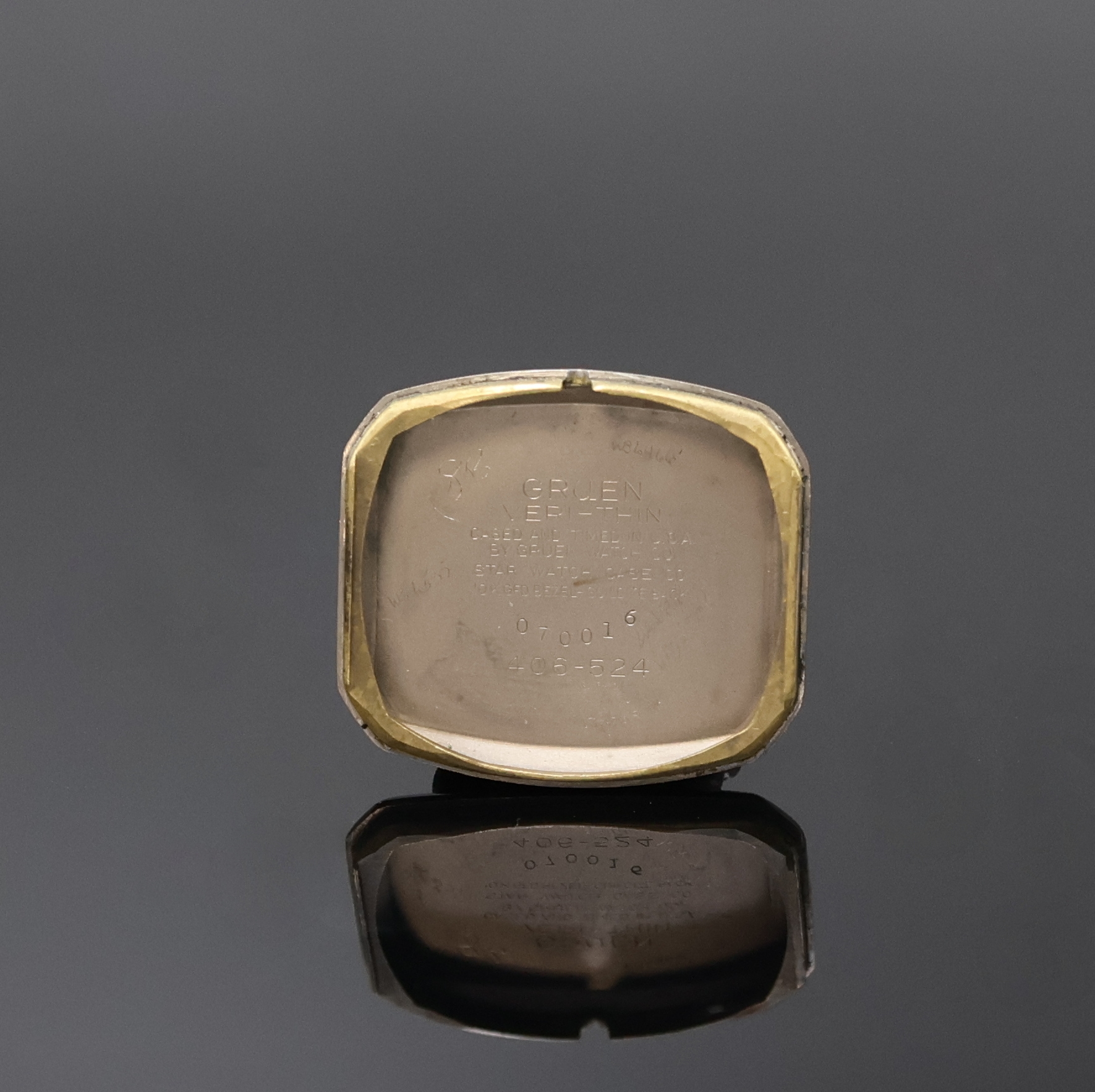 Detail d: GRUEN Veri-Thin Armbanduhr, Schweiz/USA 1940er Jahre, Handaufzug, 10k Gold-filled Lünette ber., Boden aufgedr., Duoton- Zifferbl., gold. arab. ...