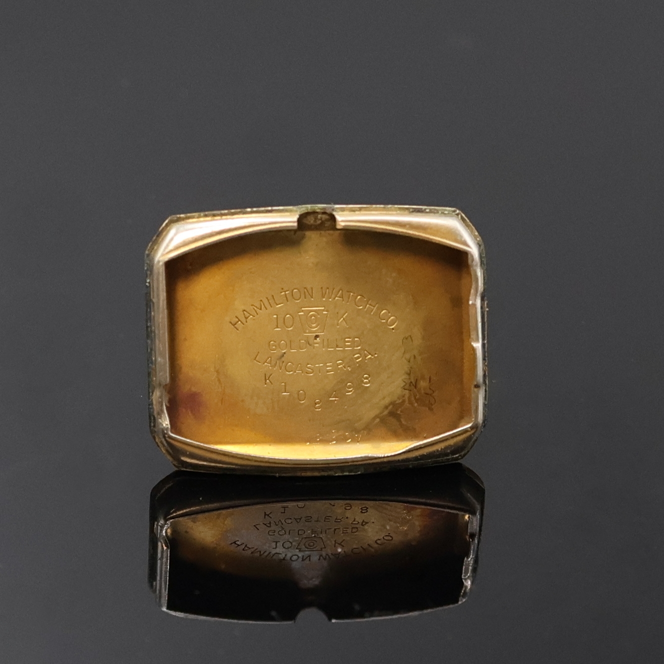 Detail d: HAMILTON Herrenarmbanduhr, Handaufzug, USA um 1945, Tonnenform 10k Gold Filled Geh. in sich gew., Boden aufgedr., vers. Zifferbl. m. aufges. arab. ...