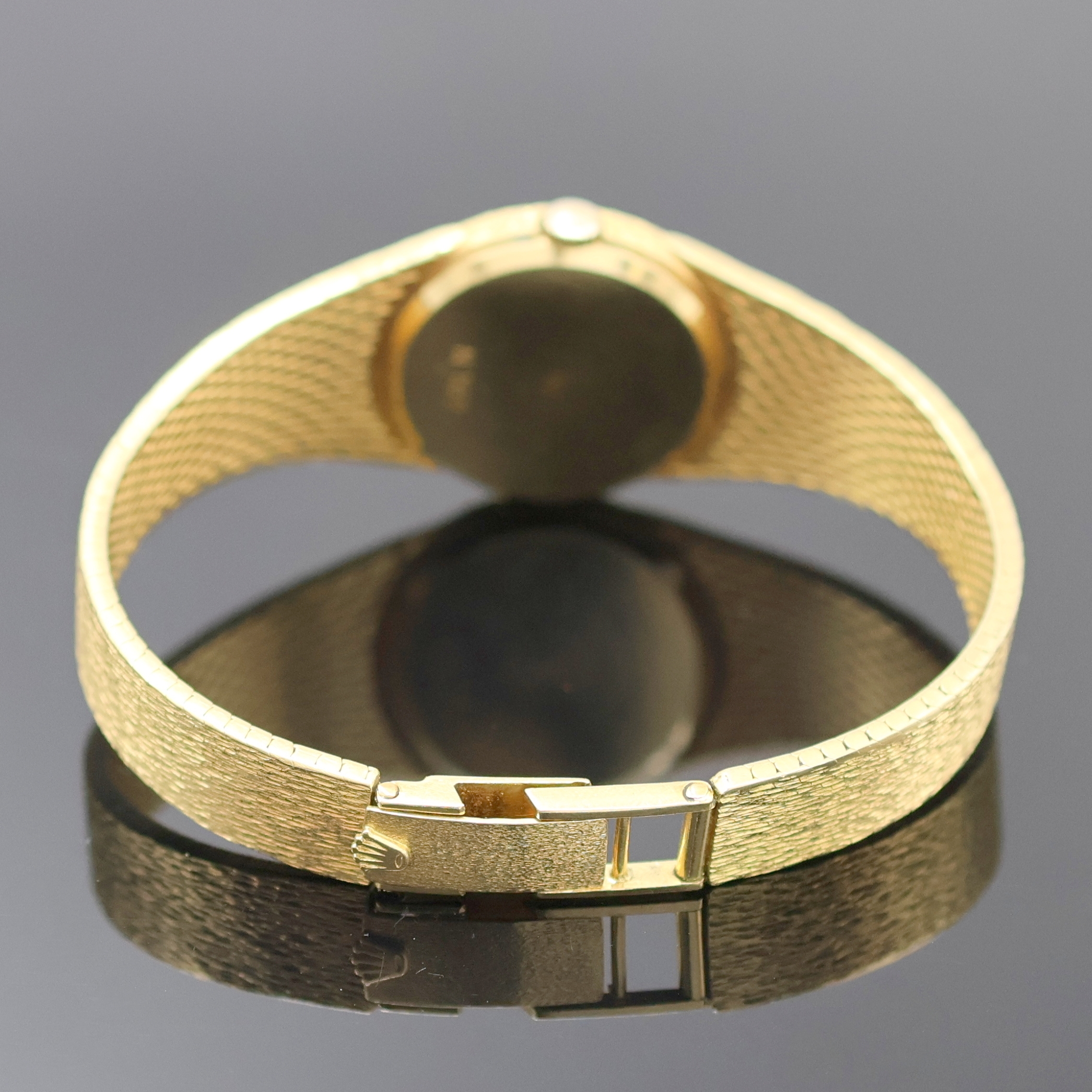 Detail b: ROLEX Damenarmbanduhr in GG 750/000, Schweiz um 1965, Handaufzug, Boden aufgedr., orig. Goldband, Champagnerfarb. Zifferbl. m. aufges. Std.-Ind., ...