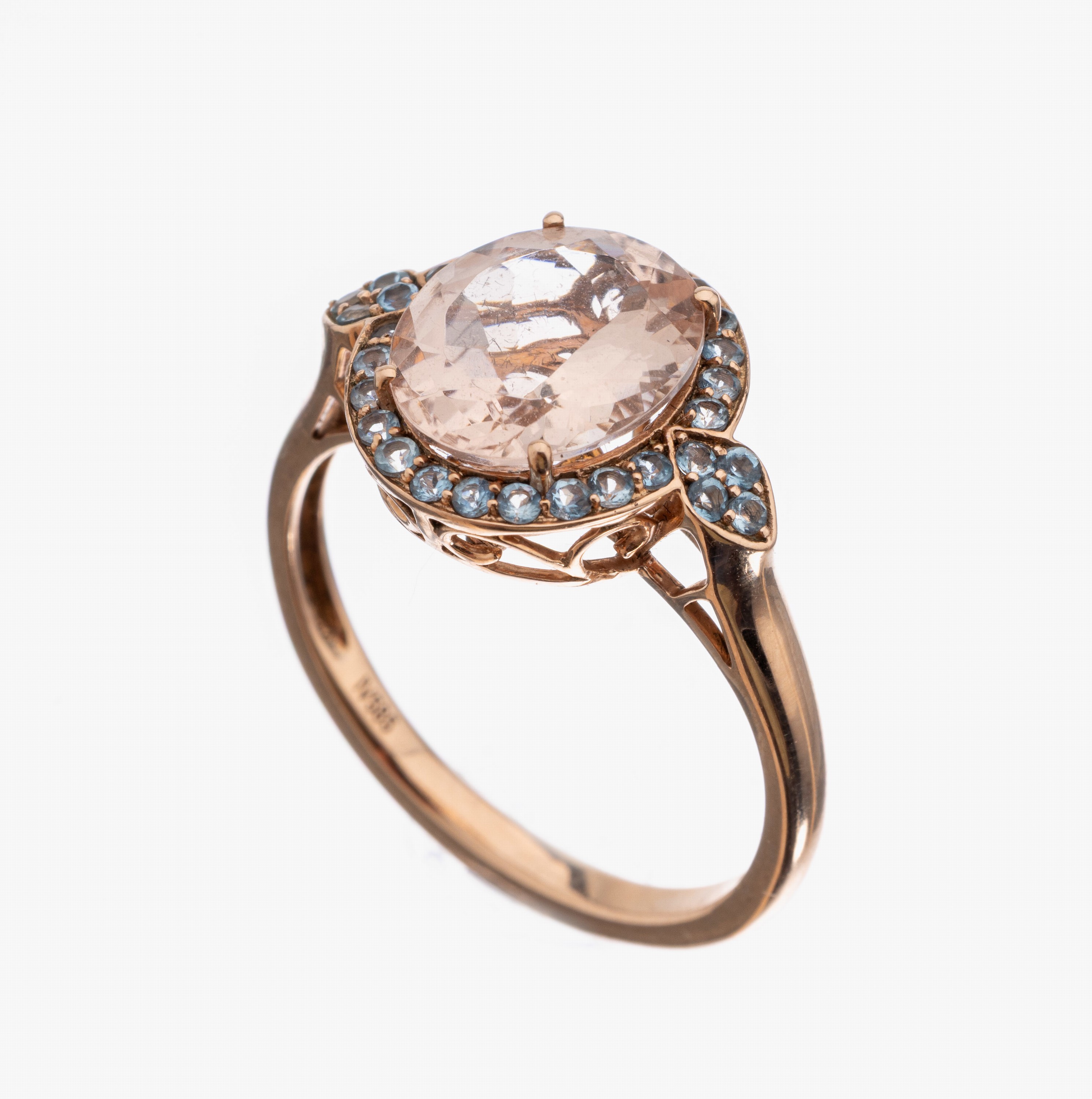 14 kt Gold Morganit-Topas-Ring, RG 585/000,mittig ein ovalfacett. Morganit ca. 5.0 ct, umgeben von 30 Blautopase (beh.) zus. ca. 0.18ct, RW 66, ca. ...