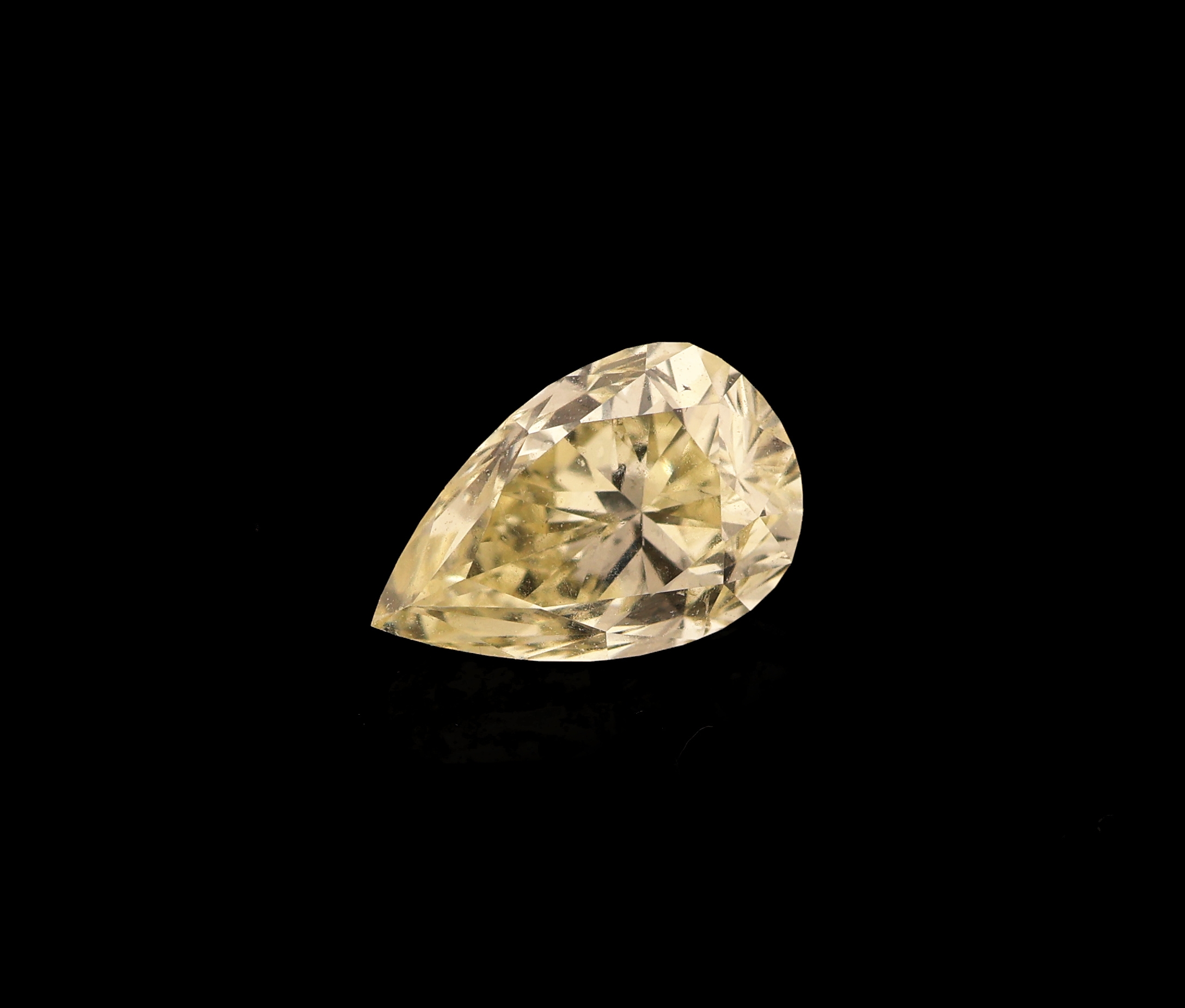 Loser Diamant 0.73 ct, natural fancy light yellow, facett. Tropfen, GIA-Report 04/16