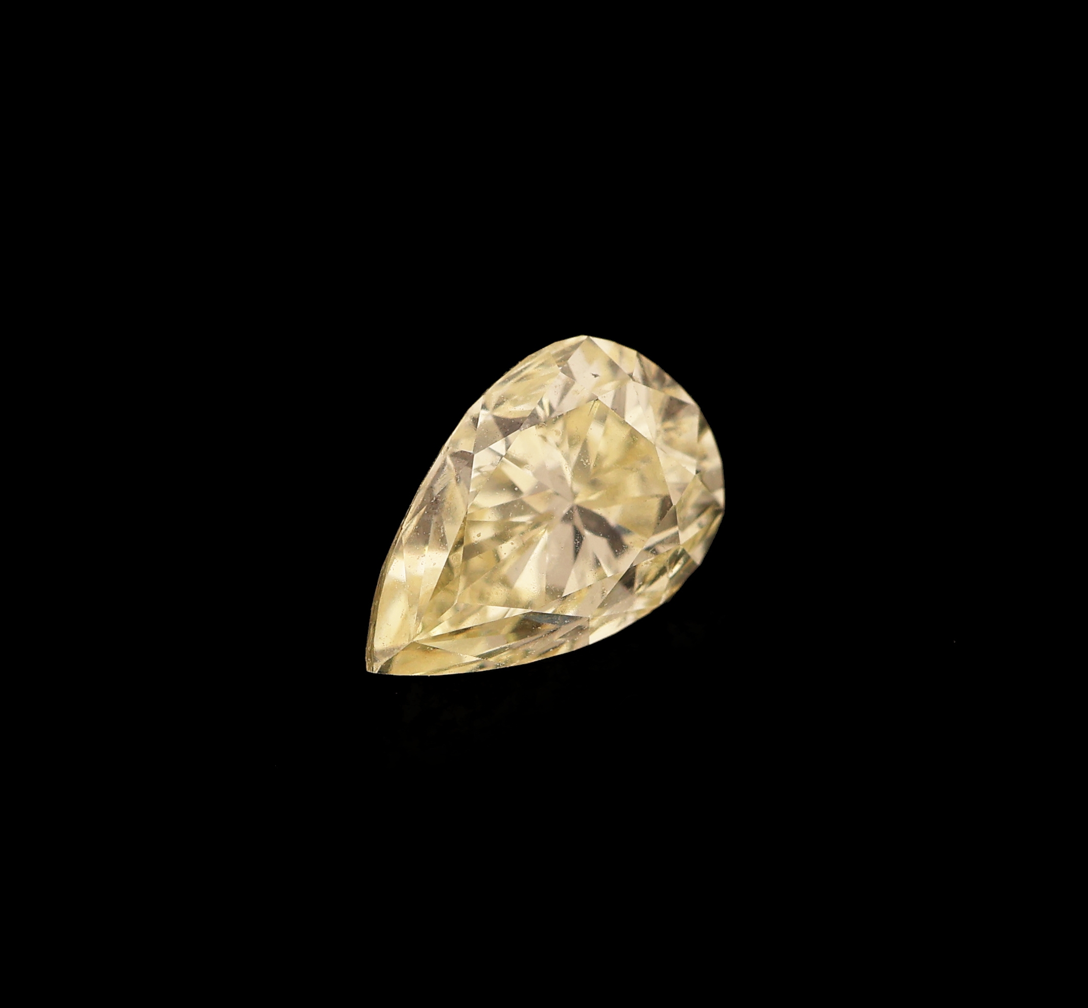 Detail a: Loser Diamant 0.73 ct, natural fancy light yellow, facett. Tropfen, GIA-Report 04/16