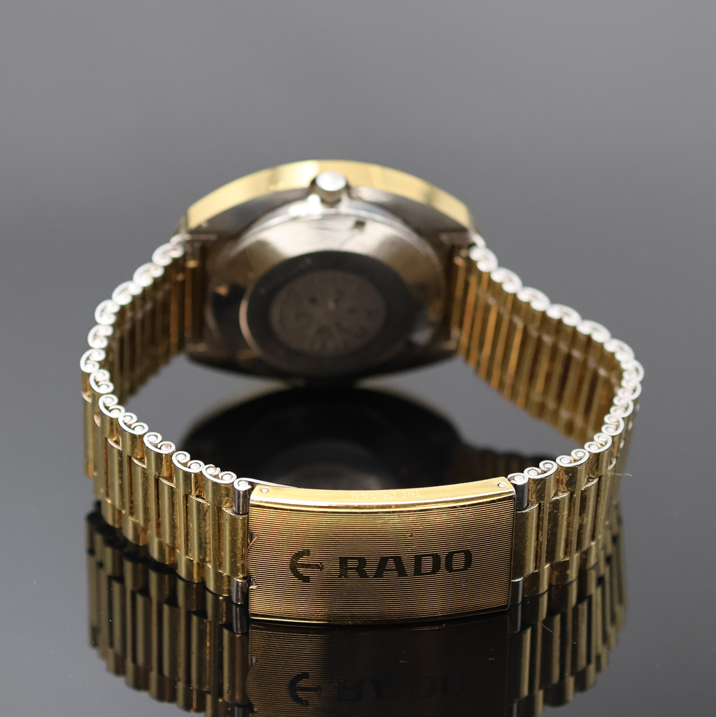 Detail b: RADO Diastar Herrenarmbanduhr Referenz 13G- 625.0013.3, Schweiz um 1975, Automatik, verg. Geh. inkl. orig. Gliederband m. Faltschl., Boden verschr., ...