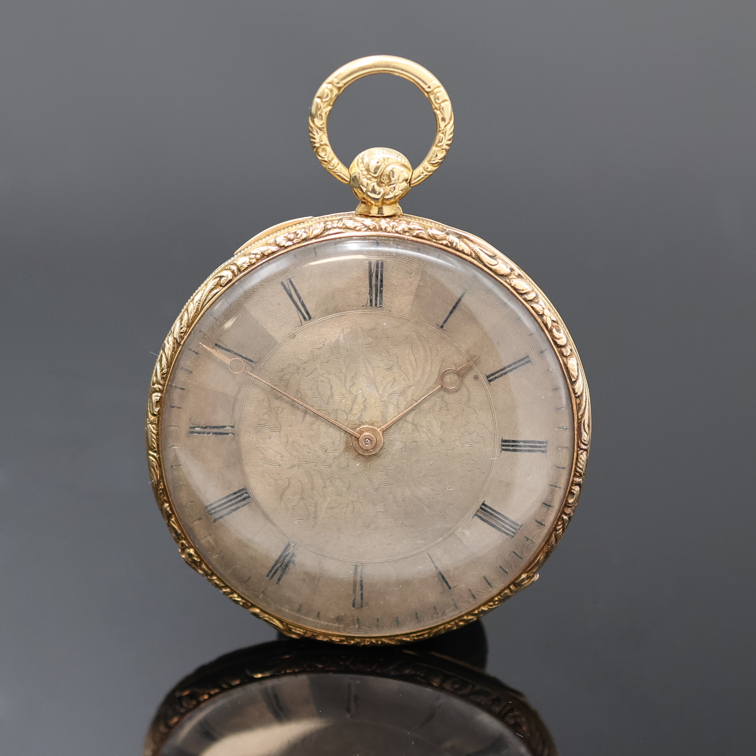 Offene Herrentaschenuhr in GG 750/000, Schweiz um 1840, floral grav. u. guill. Geh. dell., verg. Cuvette, sign., vers. Zifferbl. m. röm. Zahlen, ...