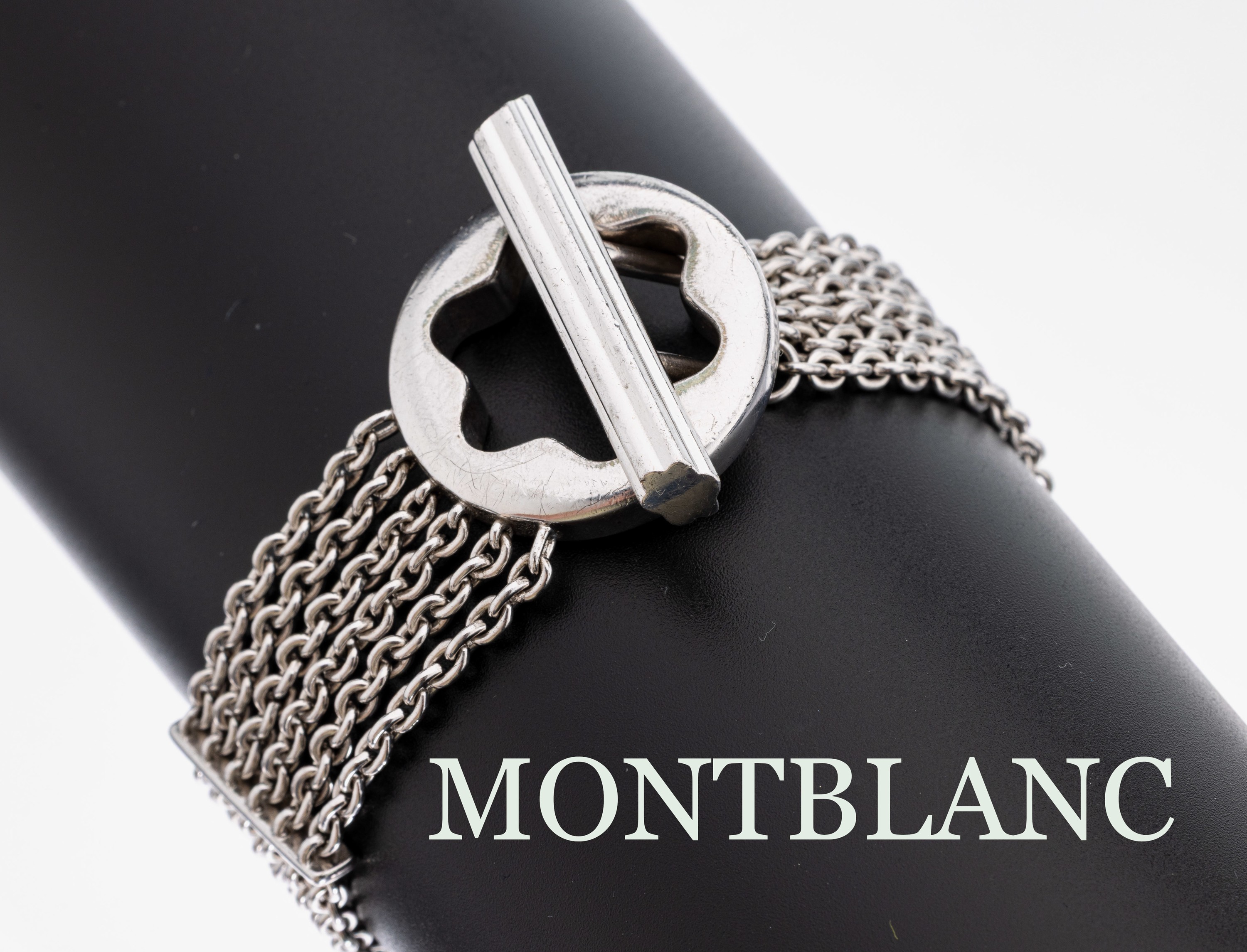MONTBLANC Armband, 925er Silber, 6-rhg. L. ca. 20 cm, Knebelschließe, sign., ca. 46.5 g
