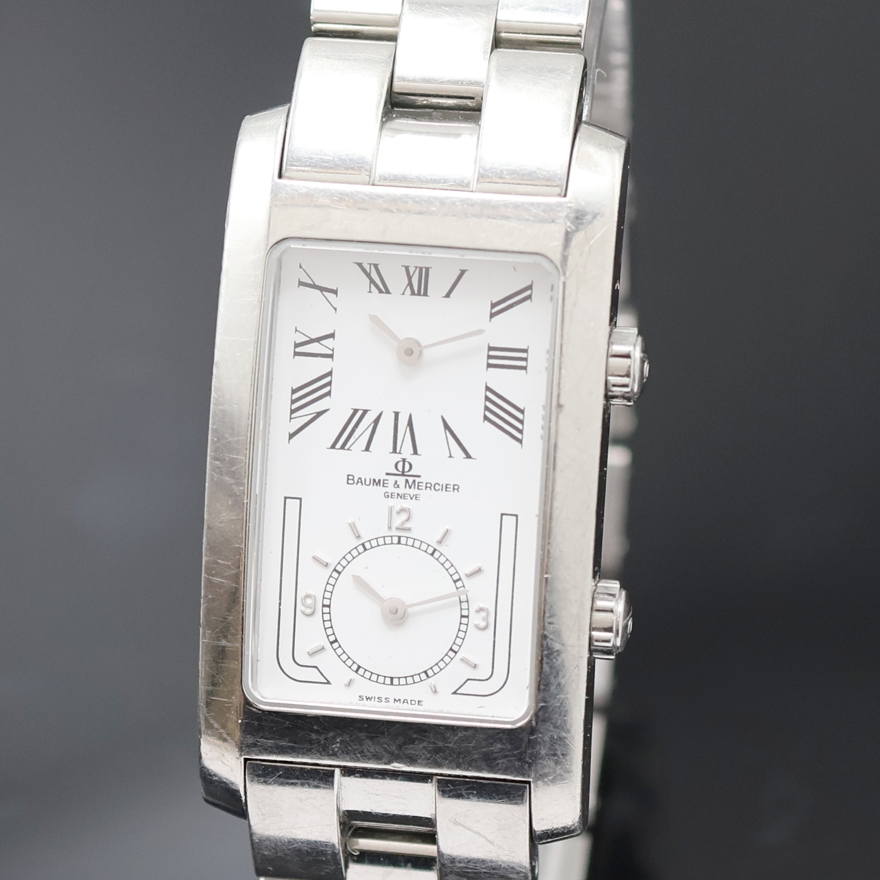 Detail a: BAUME & MERCIER Armbanduhr Modell Hampton Dual Time Referenz MV045121, Schweiz um 2005, quarz, Edelstahlgeh. inkl. orig. Gliederband m. dopp. ...