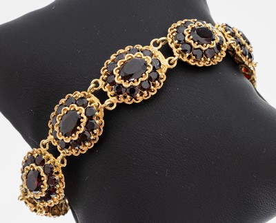 Image 8 kt Gold Granat-Armband, GG 333/000, 9 ovale Glieder, mit oval- und rundfacett. ...