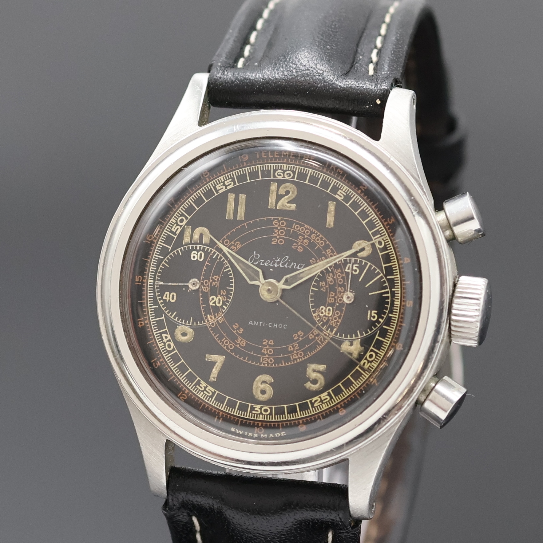 Detail a: BREITLING früher Schaltradchronograph in Stahl mit seltenem schwarzen Glanzzifferblatt, Schweiz um 1950, Handaufzug, sog. Clamshell- Geh., korrod. ...
