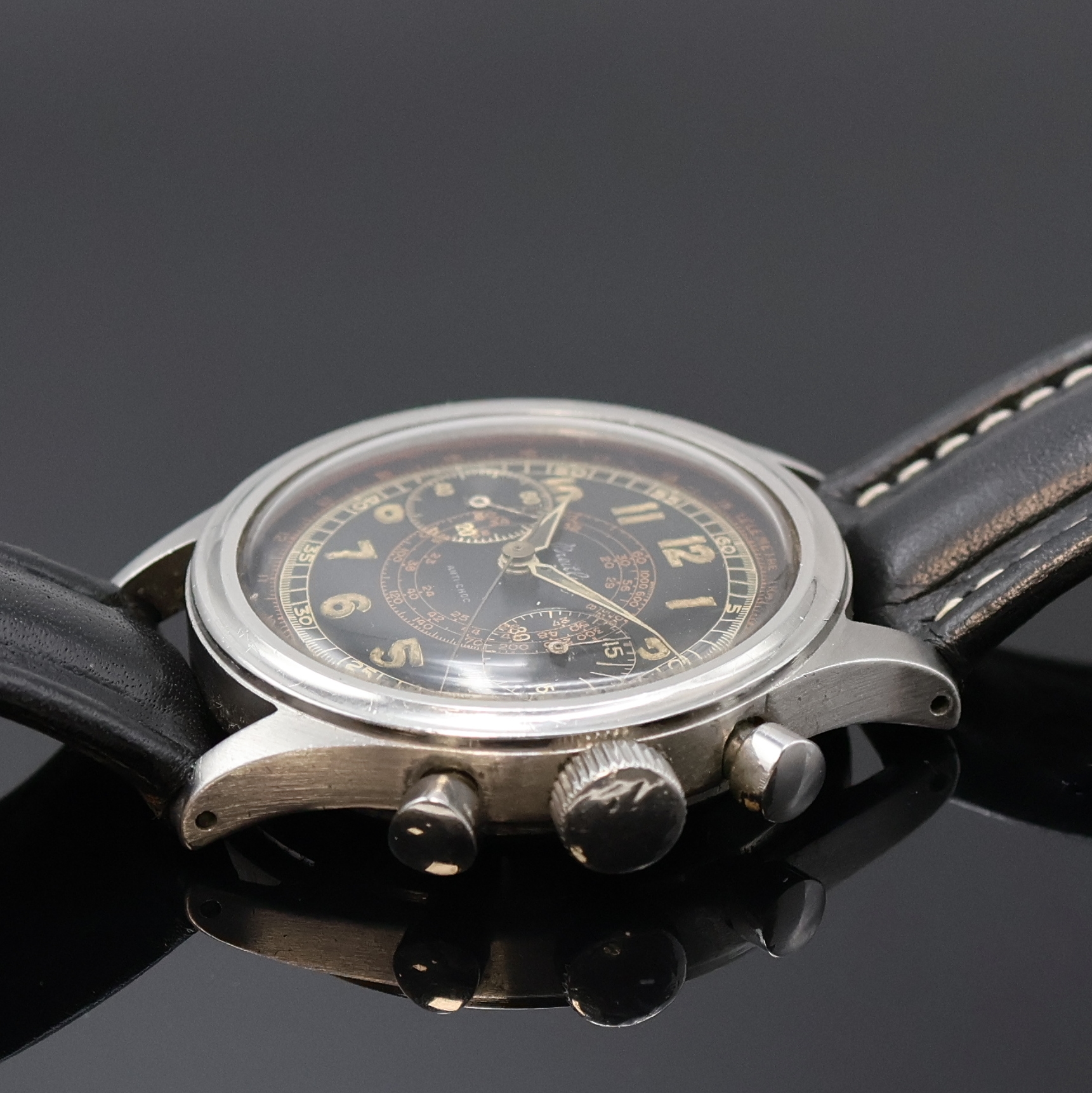 Detail b: BREITLING früher Schaltradchronograph in Stahl mit seltenem schwarzen Glanzzifferblatt, Schweiz um 1950, Handaufzug, sog. Clamshell- Geh., korrod. ...