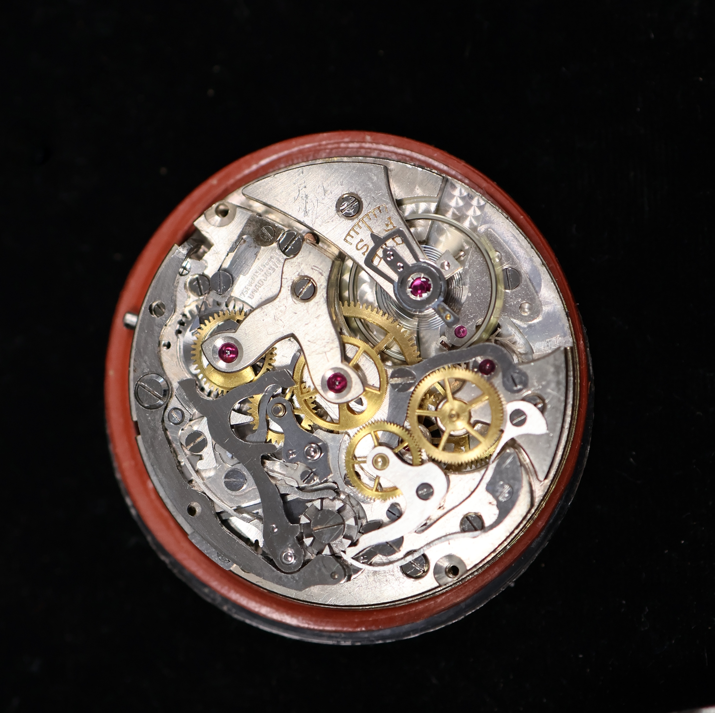 Detail e: BREITLING früher Schaltradchronograph in Stahl mit seltenem schwarzen Glanzzifferblatt, Schweiz um 1950, Handaufzug, sog. Clamshell- Geh., korrod. ...