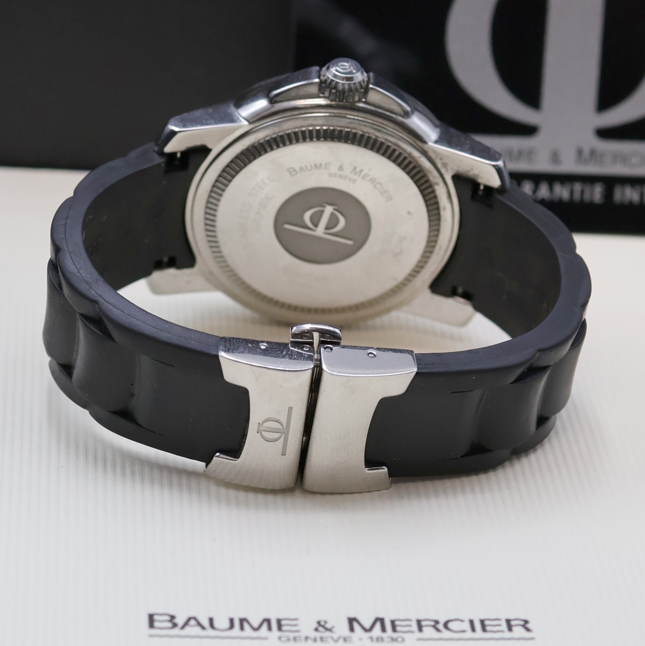 Detail b: BAUME & MERCIER Capeland Herrenarmbanduhr Referenz 65353, Schweiz verk. lt. Pap. 02/2011, Automatik, Boden u. Krone verschr., orig. Kautschukband m. ...