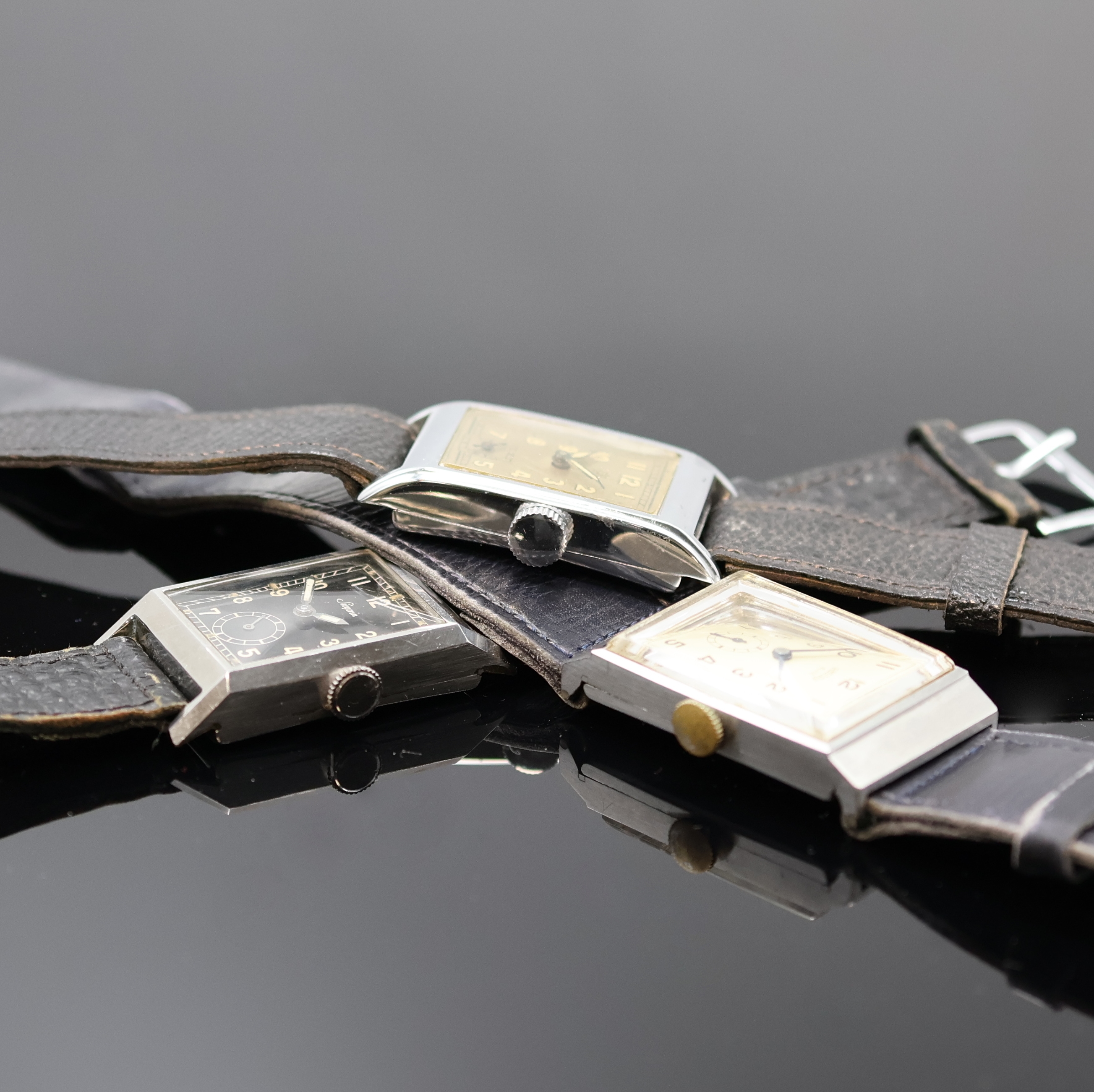 Detail a: ARCTOS/UROFA 58 sowie 2 weitere rechteckige Armbanduhren, Handaufzug, 1) Arctos Elite, 2-tlg. Stahlgeh., silb. Zifferbl., gebl. Zeiger, versilb. Werk ...