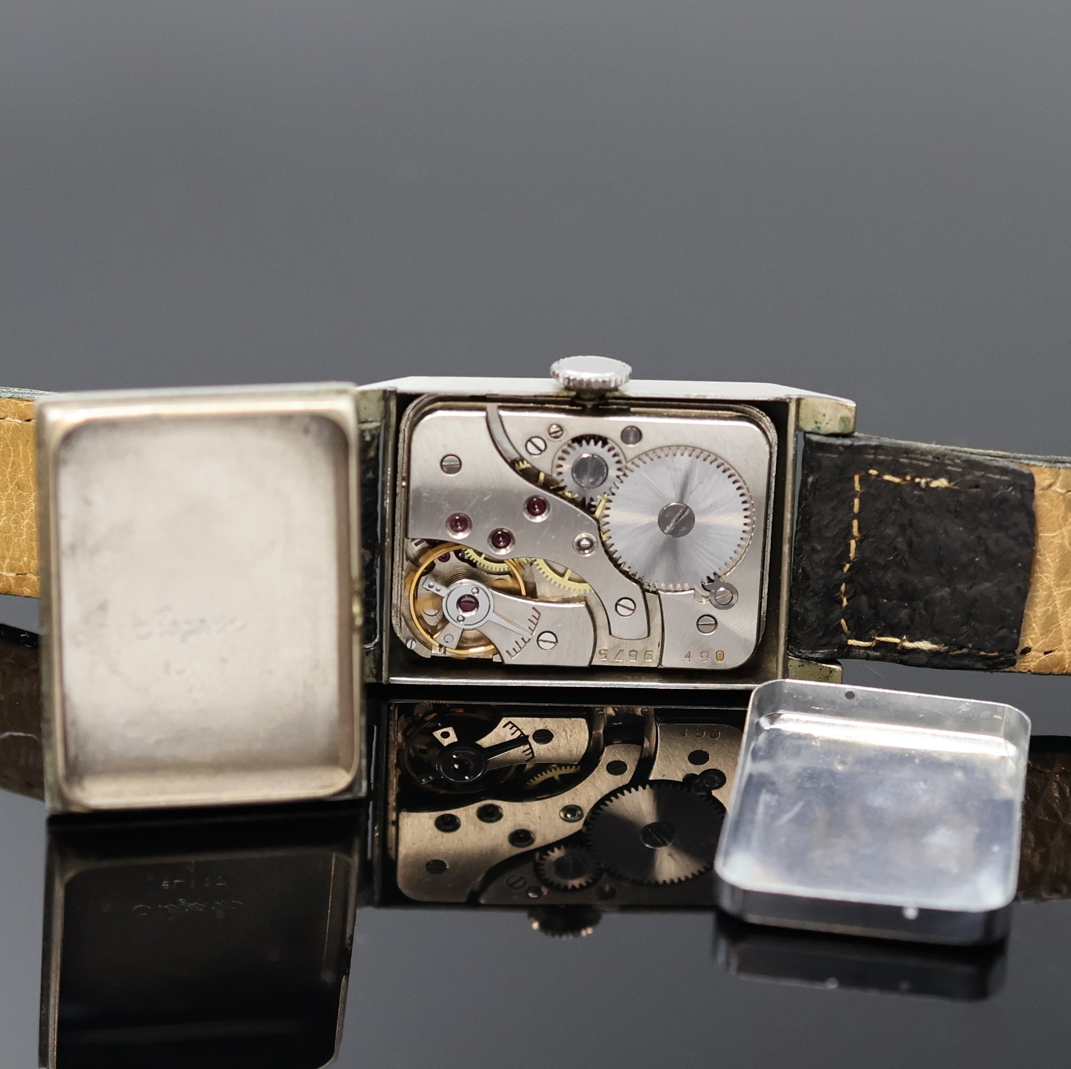 Detail e: ARCTOS/UROFA 58 sowie 2 weitere rechteckige Armbanduhren, Handaufzug, 1) Arctos Elite, 2-tlg. Stahlgeh., silb. Zifferbl., gebl. Zeiger, versilb. Werk ...