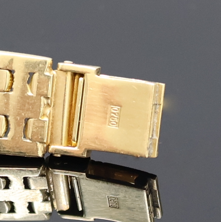 Detail c: Damenarmbanduhr in GG 750/000 mit Diamanten, Schweiz/Deutschland um 1990, massives Goldgeh. inkl. Gliederband, Lünette wie Band aufw. m. Diamanten ...