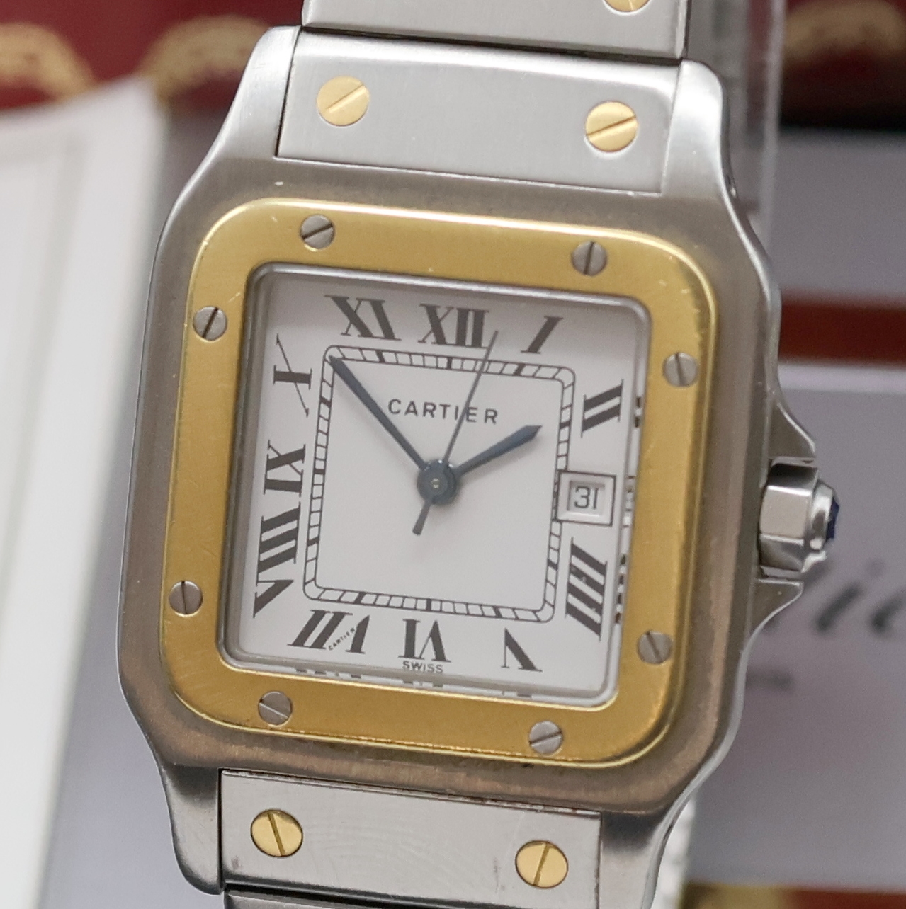 Detail a: CARTIER Santos Herrenarmbanduhr in Stahl/Gold Referenz 1172961, Schweiz um 1990, Automatik, Monocoque-Geh., Lünette 8-fach verschr., orig. ...