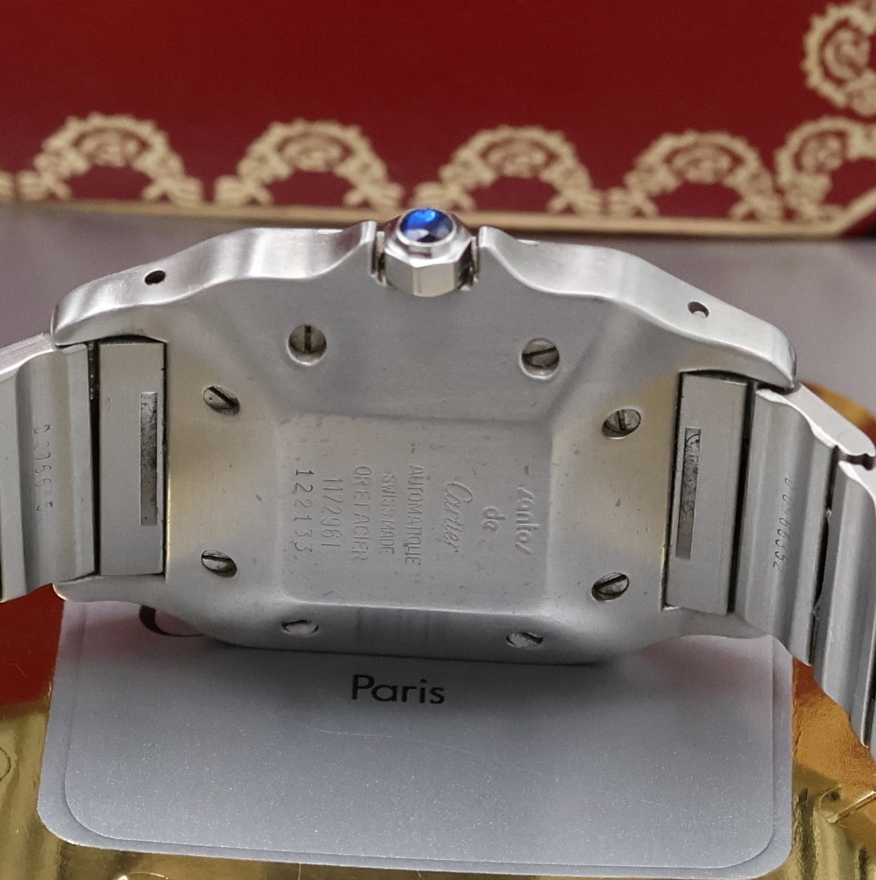 Detail d: CARTIER Santos Herrenarmbanduhr in Stahl/Gold Referenz 1172961, Schweiz um 1990, Automatik, Monocoque-Geh., Lünette 8-fach verschr., orig. ...