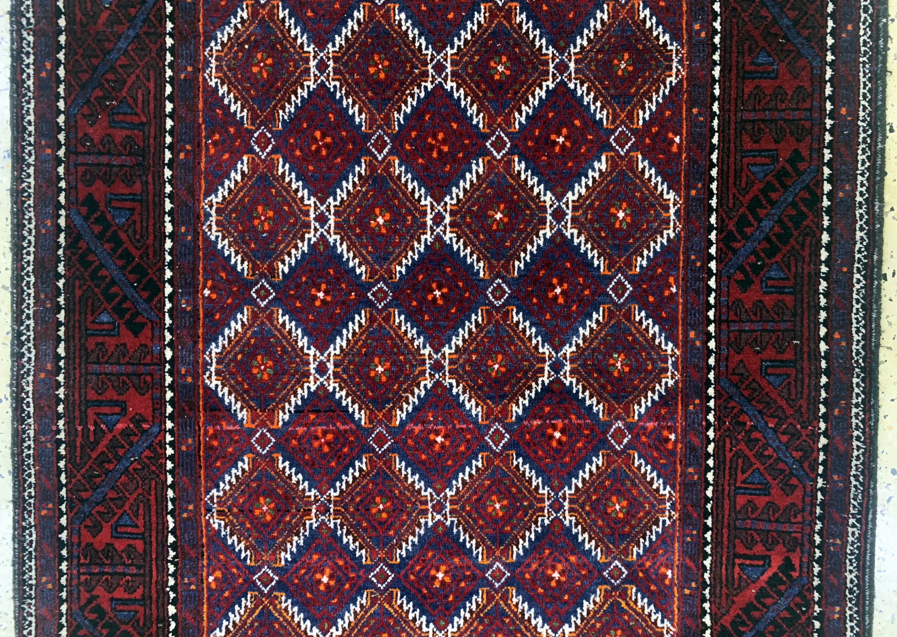 Detail b: Belutsch, Persien, Mitte 20.Jhd, Wolle auf Baumwolle, ca. 177 x 103 cm, EHZ: 1-2