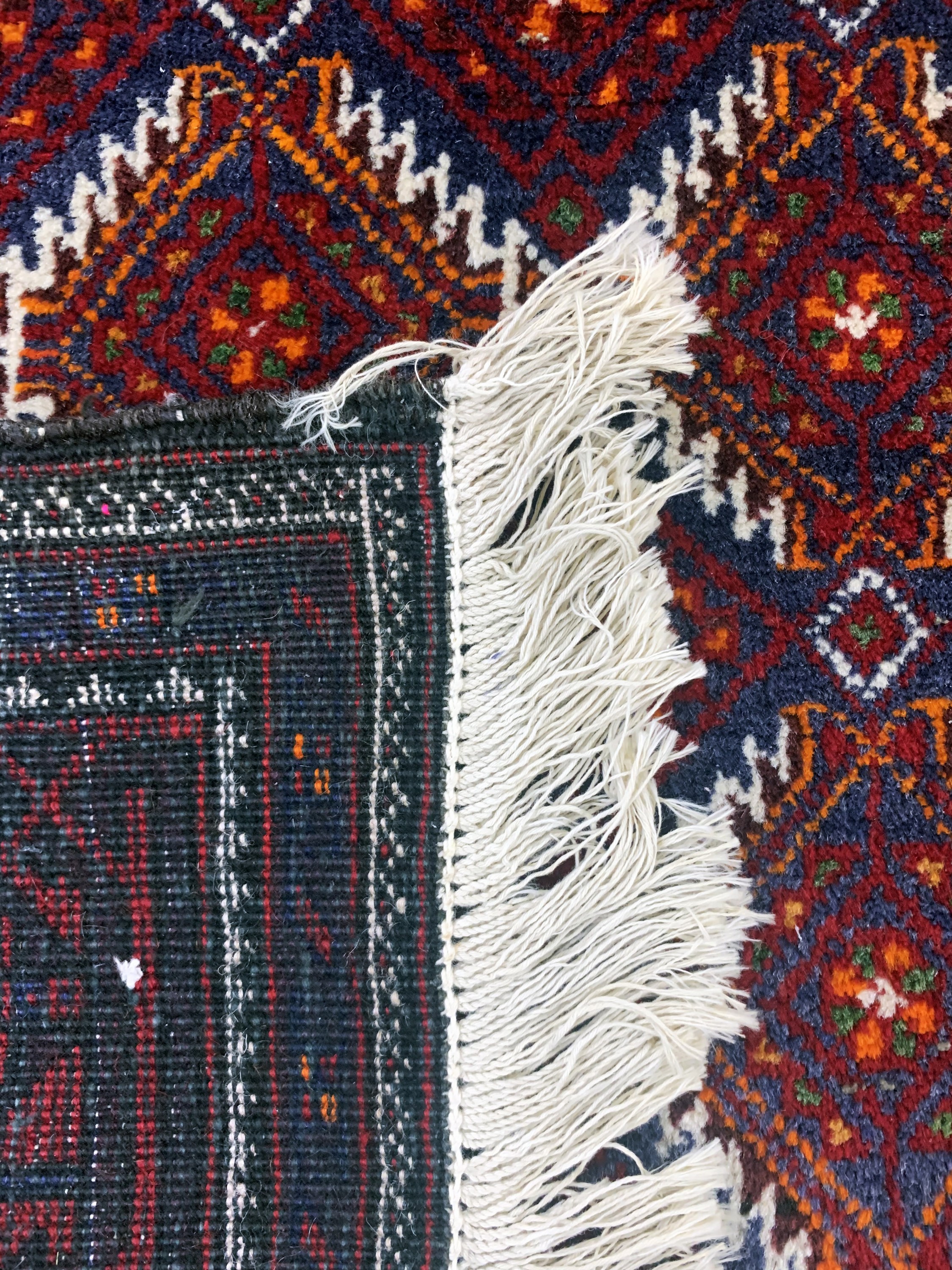 Detail e: Belutsch, Persien, Mitte 20.Jhd, Wolle auf Baumwolle, ca. 177 x 103 cm, EHZ: 1-2
