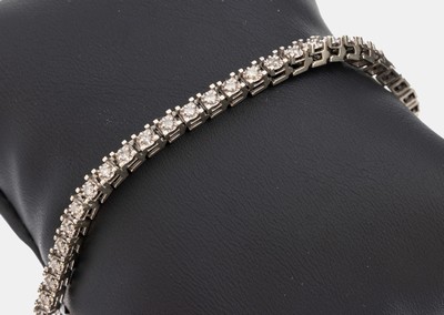 Image 10 kt Gold Brillant-Armband, WG 417/000, 50Brillanten zus. ca. 0.50 ct Weiß- ...