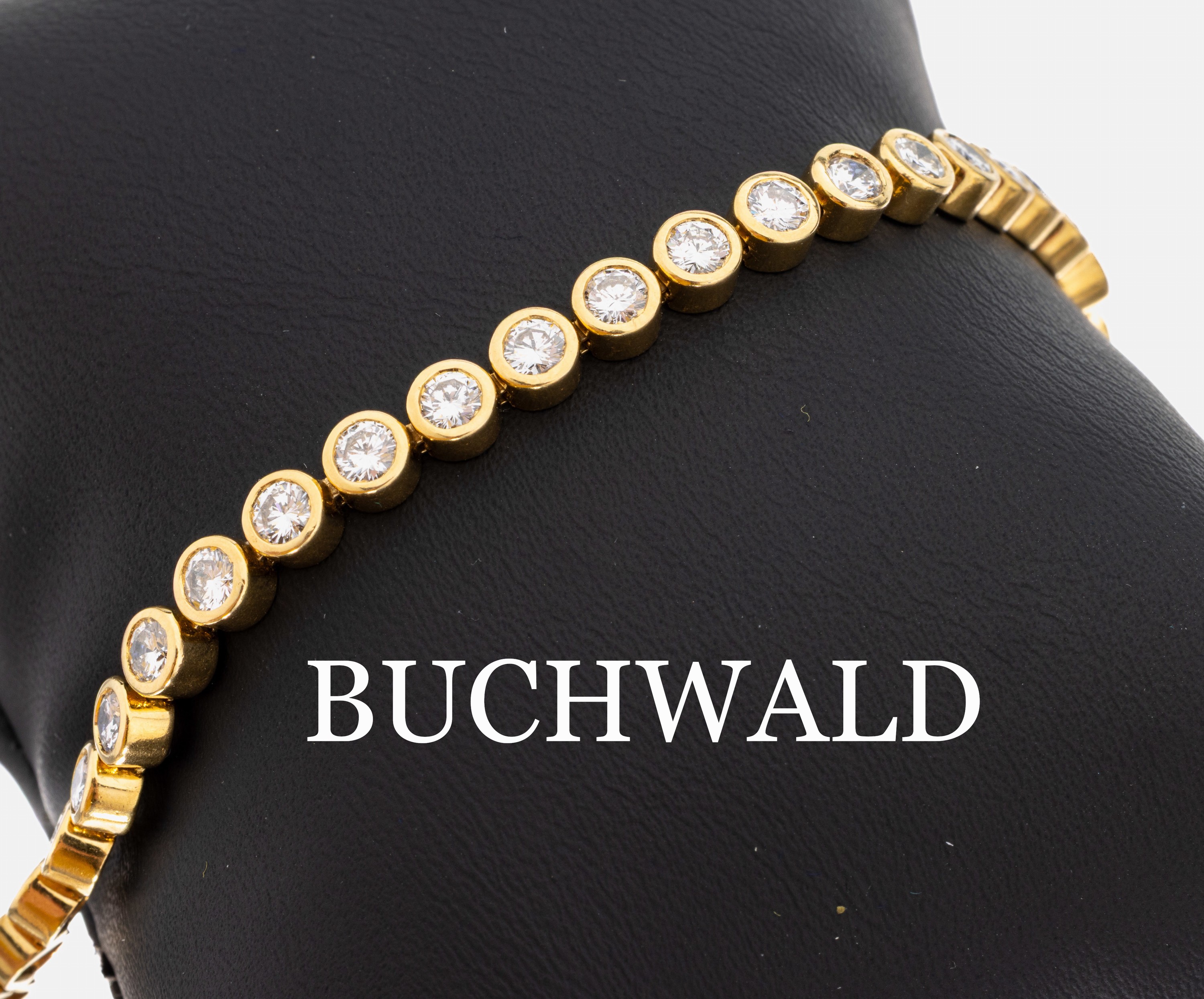 18 kt Gold BUCHWALD Brillant-Armband, GG 750/000, 40 Brillanten zus. ca. 5.32 ct (grav.) feines Weiß/si, ca. 17.4 g, L. ca. 19.5 cm, Kastenschloss ...