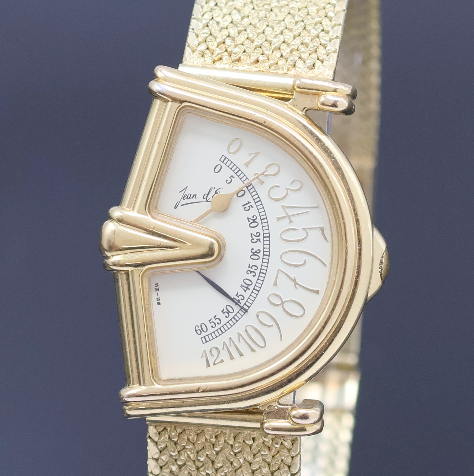Detail a: JEAN D'EVE Sectora vergoldete Armbanduhr an GG 585/000 Band, Schweiz um 1990, quarz, asym. Gehäuse, Boden aufgedr., cremefarb. Zifferbl. mit ...