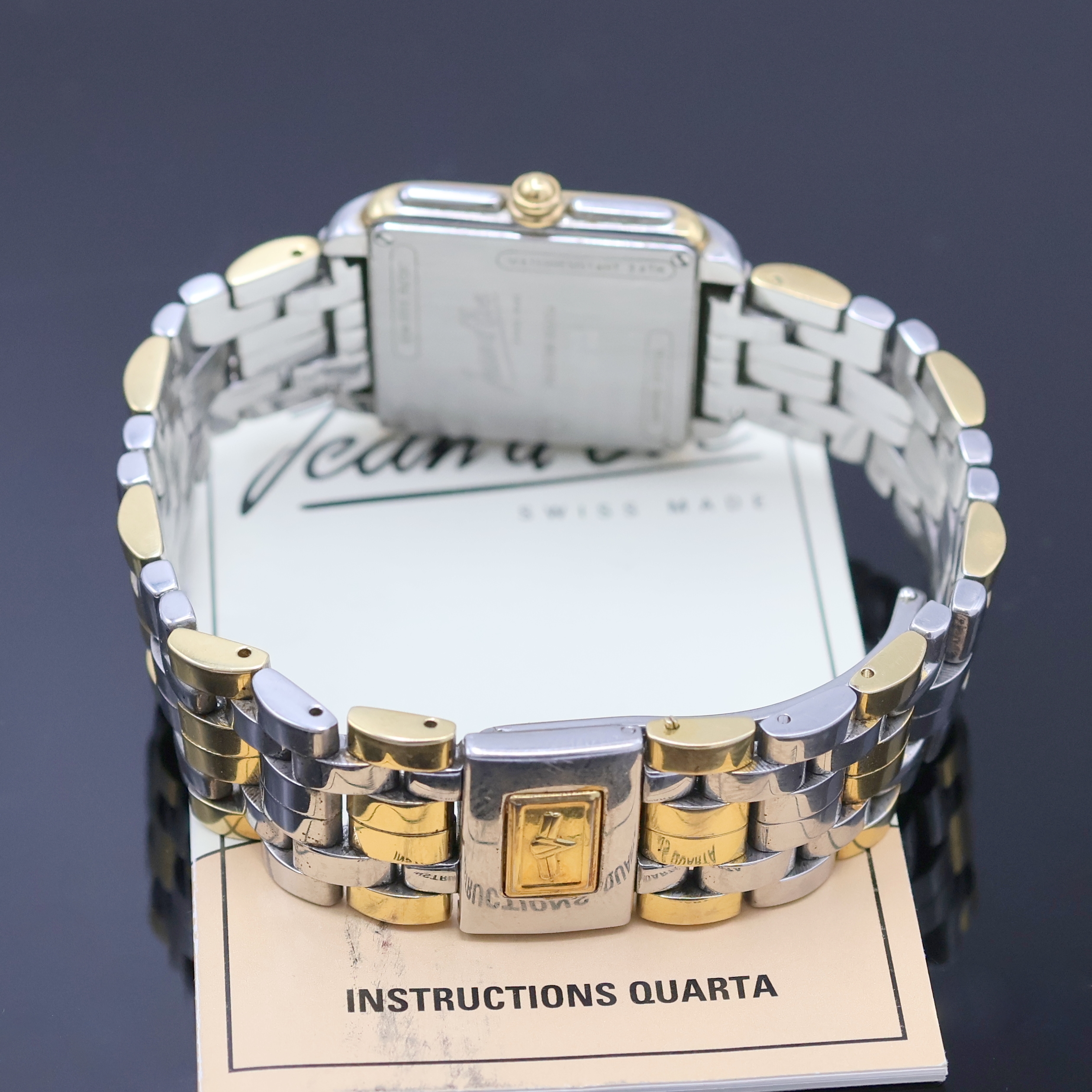 Detail b: JEAN D'EVE Collection Quarta Armbanduhr Referenz 09.24.65, Schweiz um 1990, quarz, Boden 4-fach verschr., Saphirgl., weißes Zifferbl., 4 ...