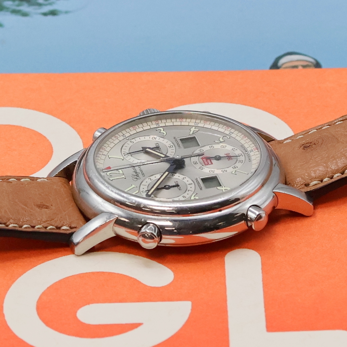 Detail c: CHOPARD Fahreruhr Mille Miglia 1996 auf 750 Stück limitierter Armbandchronograph Referenz 8309 inklusive 2 Helmen und Fahrtenbuch, Schweiz um 1996, ...